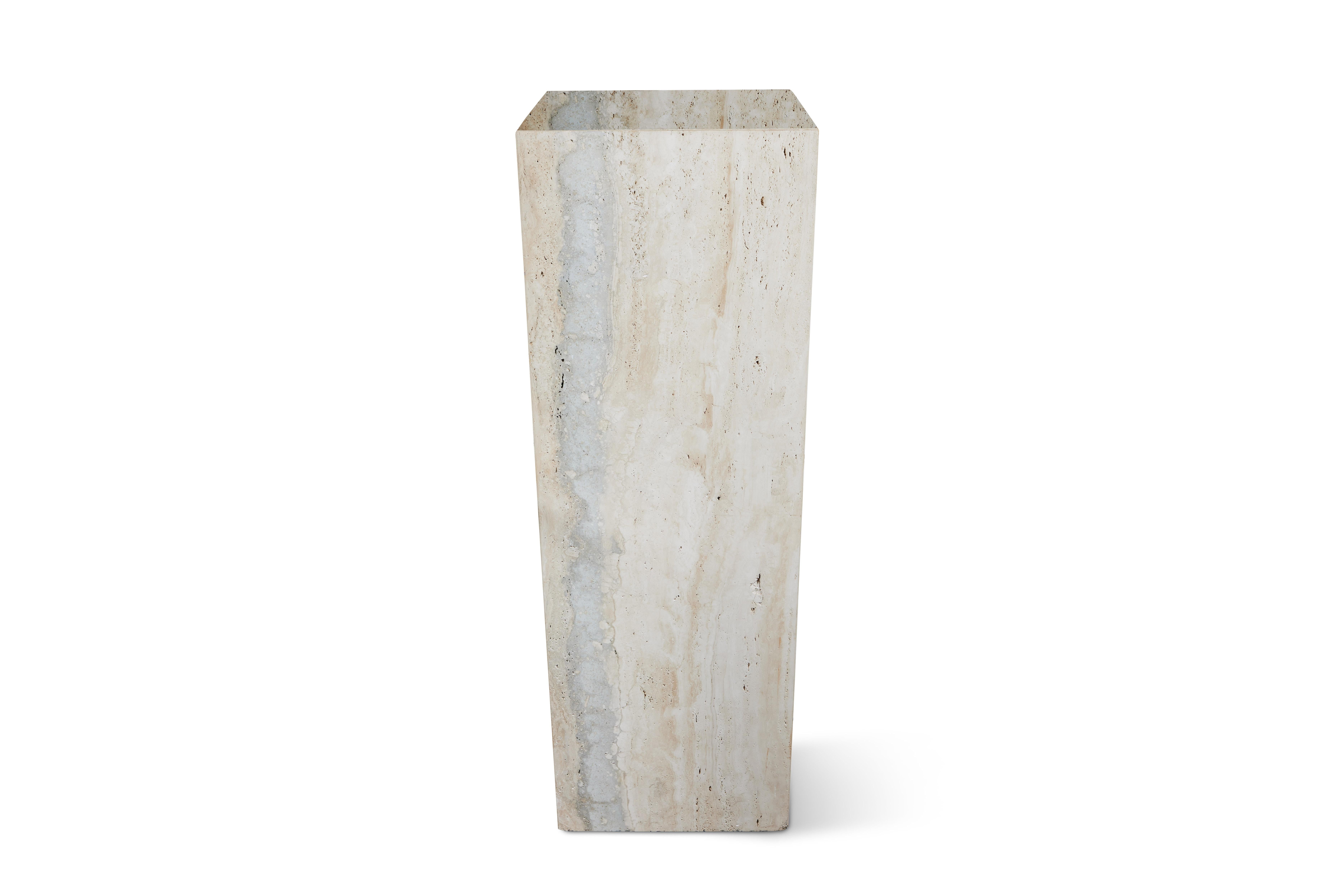 Impressively scaled custom travertine pedestal, circa 1990's, This piece came from the estate of longtime Jeopardy post Alex Trebek.
