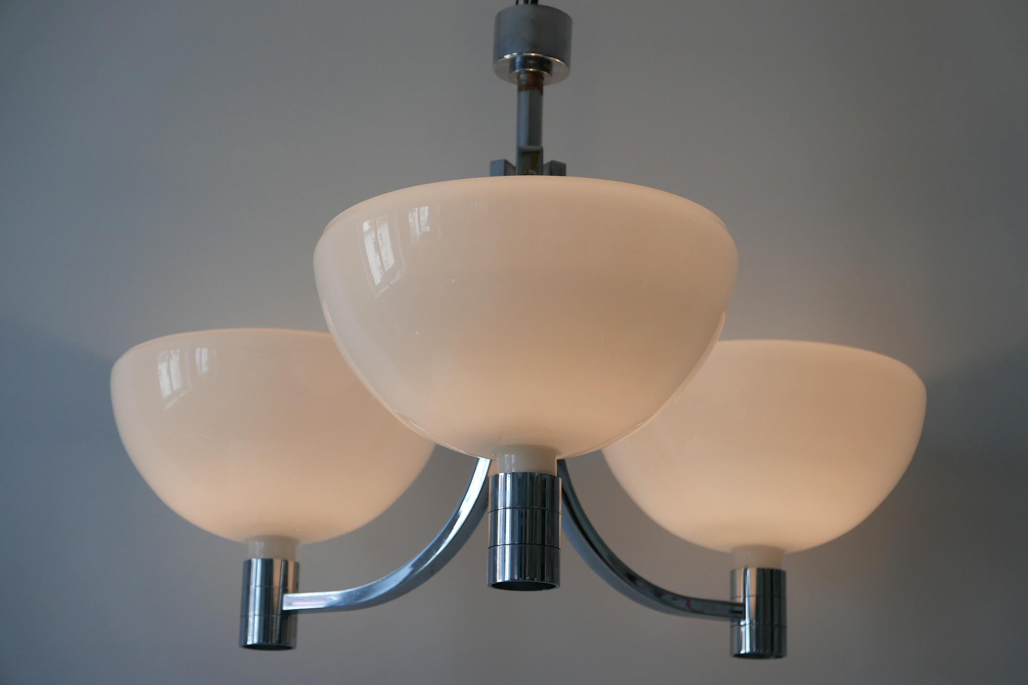 Extremely rare and huge Mid-Century Modern triple AM/AS Series chandelier or pendant lamp. Designed by Franco Albini & Franca Helg for Sirrah, 1969 in Italy.

The lamp shades can be mounted as up or down lighter!

Executed in glossy opaline glass
