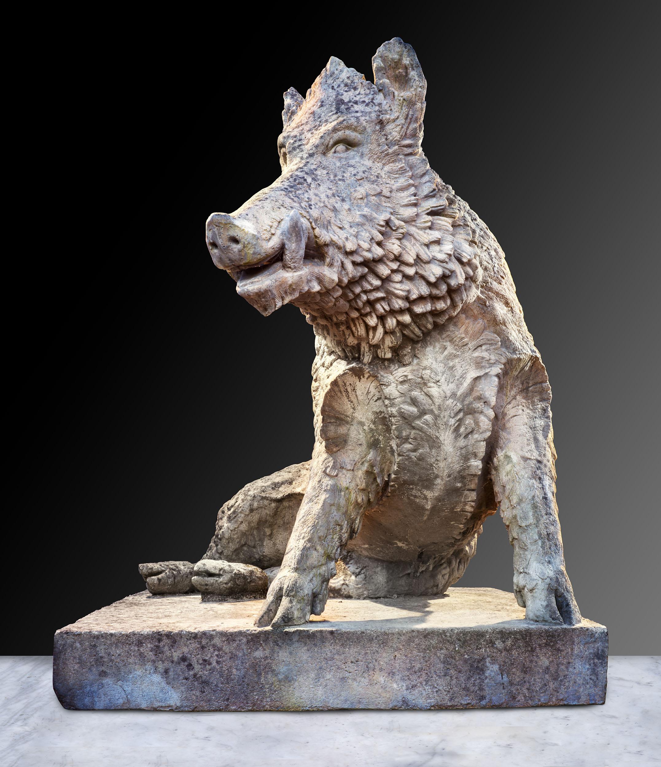 A mid-19th century model of the Uffizi Boar, called 'Il Porcellino', by Austin & Seeley, the seated figure of the boar on an integral square plinth.

This cast stone model of the Uffizi Boar takes its name from a 17th-century bronze fountain by