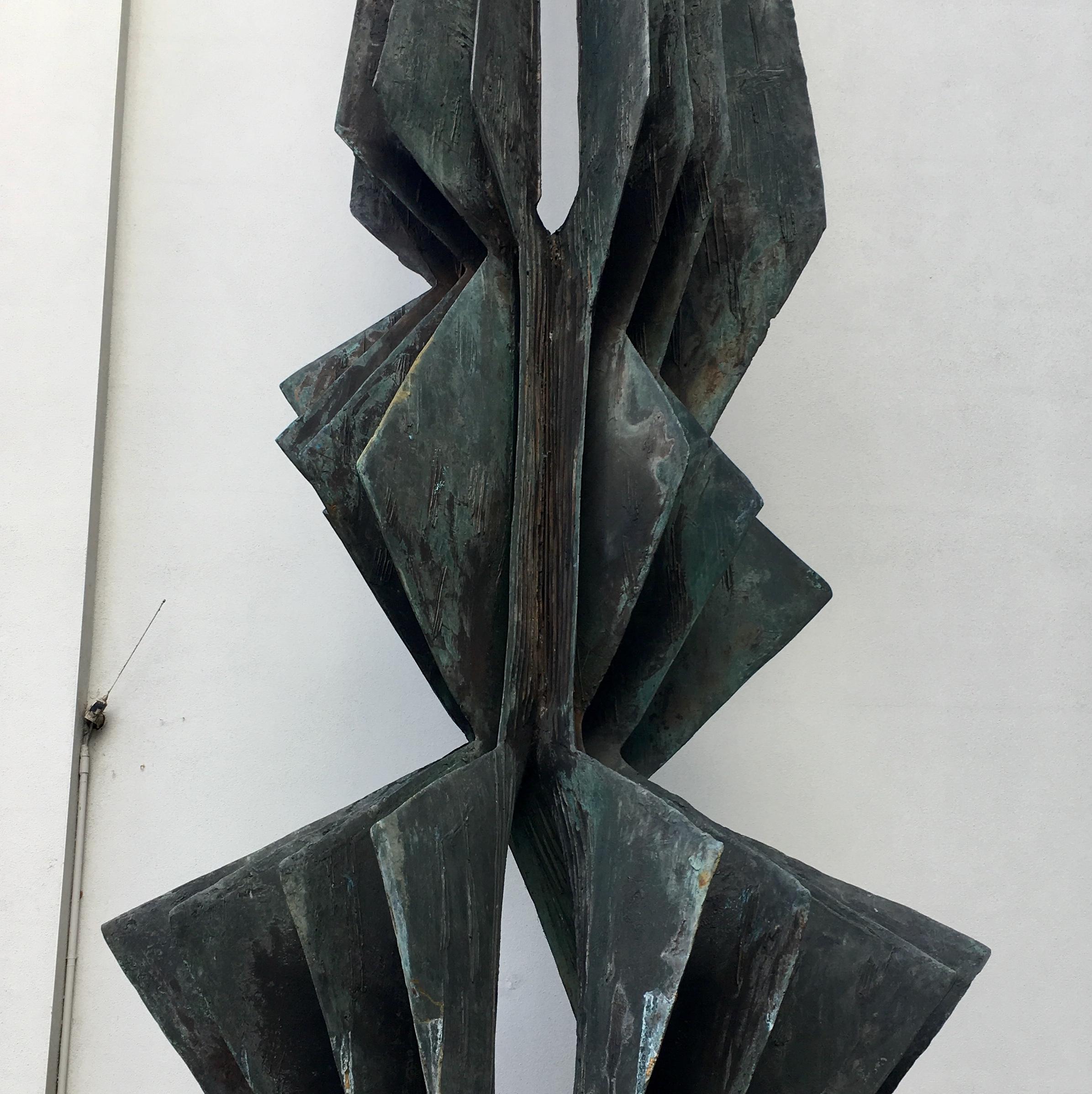 A monumental bronze sculpture titled 'Grande Tensione Verticale' signed Toni Fabris and dated '1960 1 of 1' making this a unique sculpture.

This magnificent sculpture was originally purchased directly from the artist by Senator Fontana in