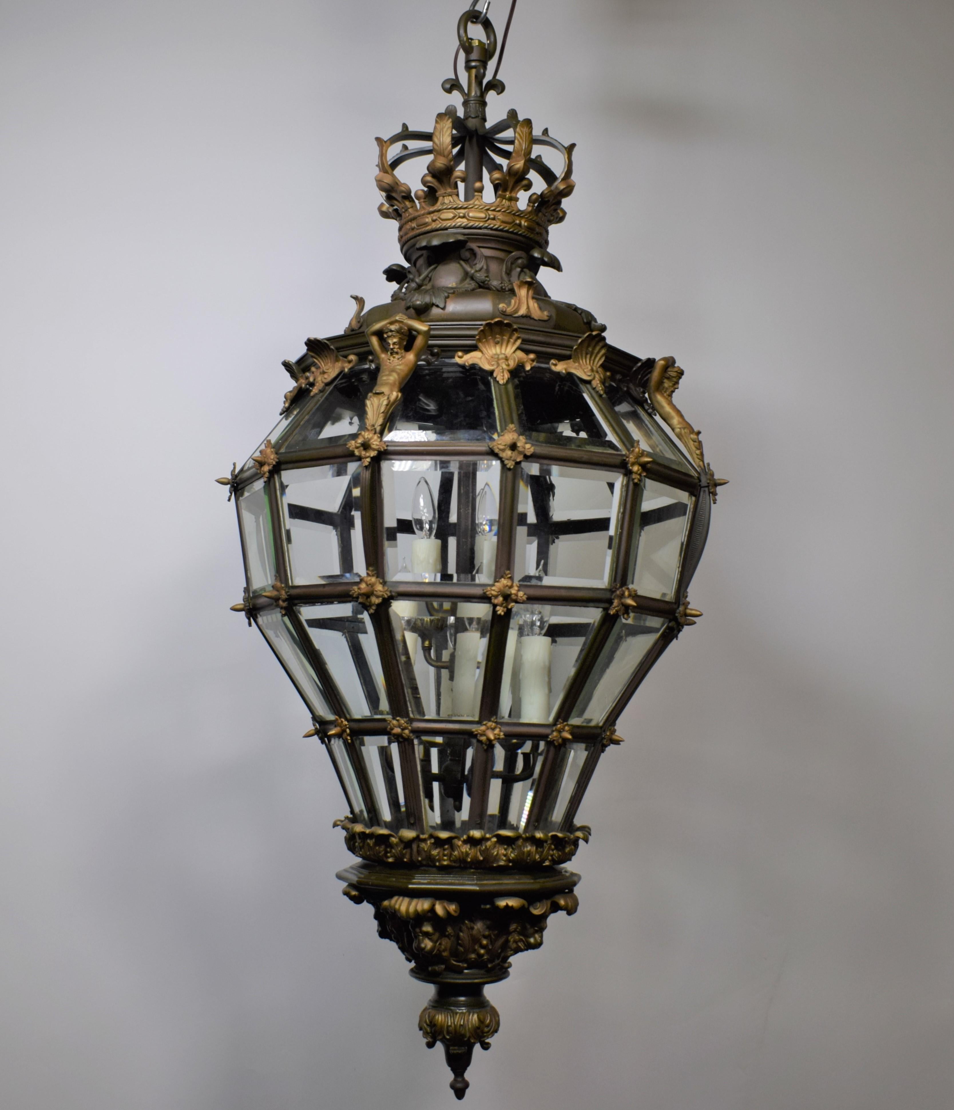 A very fine bronze & gilt bronze Versailles style lantern featuring beveled crystal panels. France, circa 1900
Louis XVI Versailles style nine light lantern apparently unmarked. Measures: Approx. H. 51