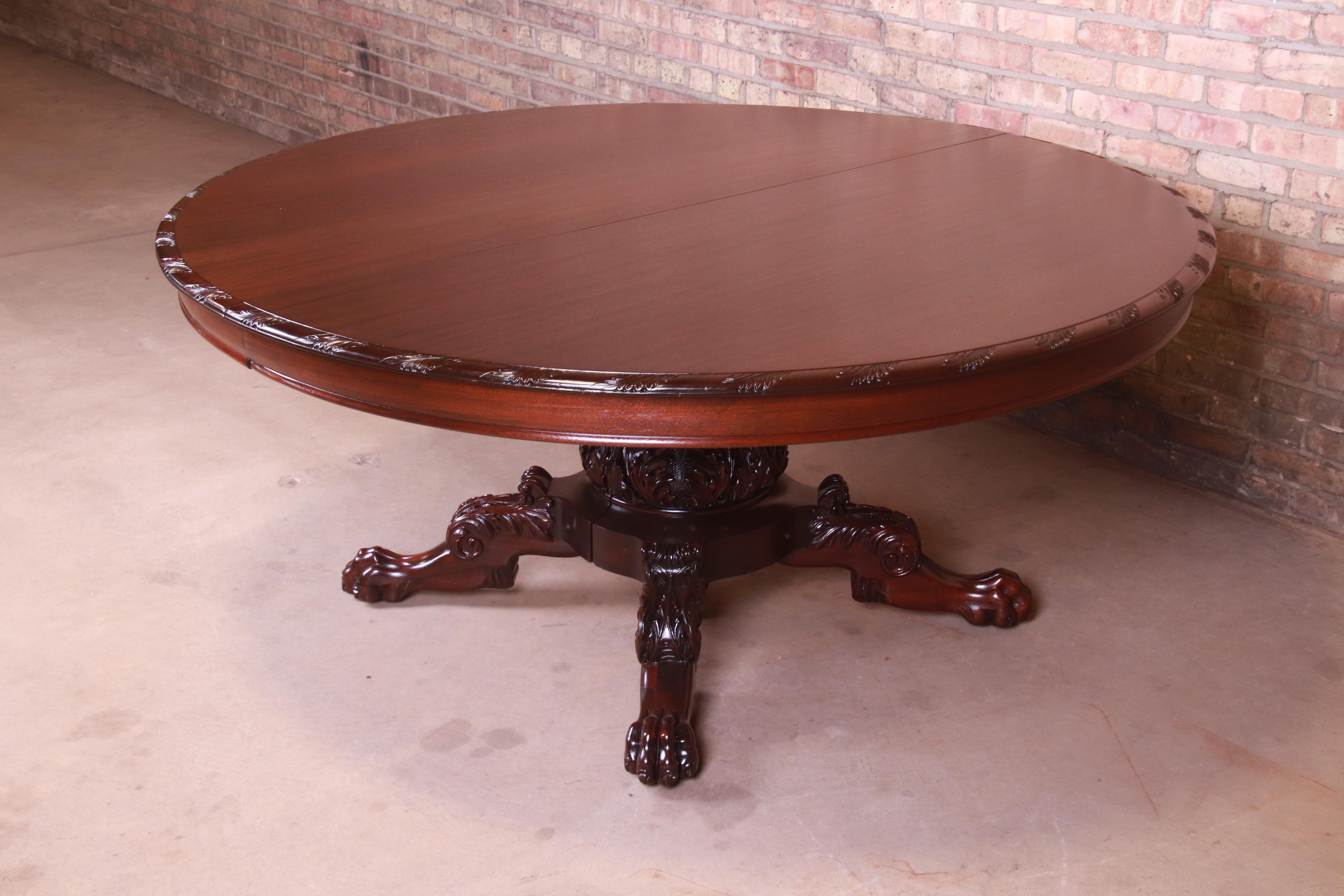 American Monumental Victorian Carved Mahogany Dining Table with Seven Leaves, Refinished