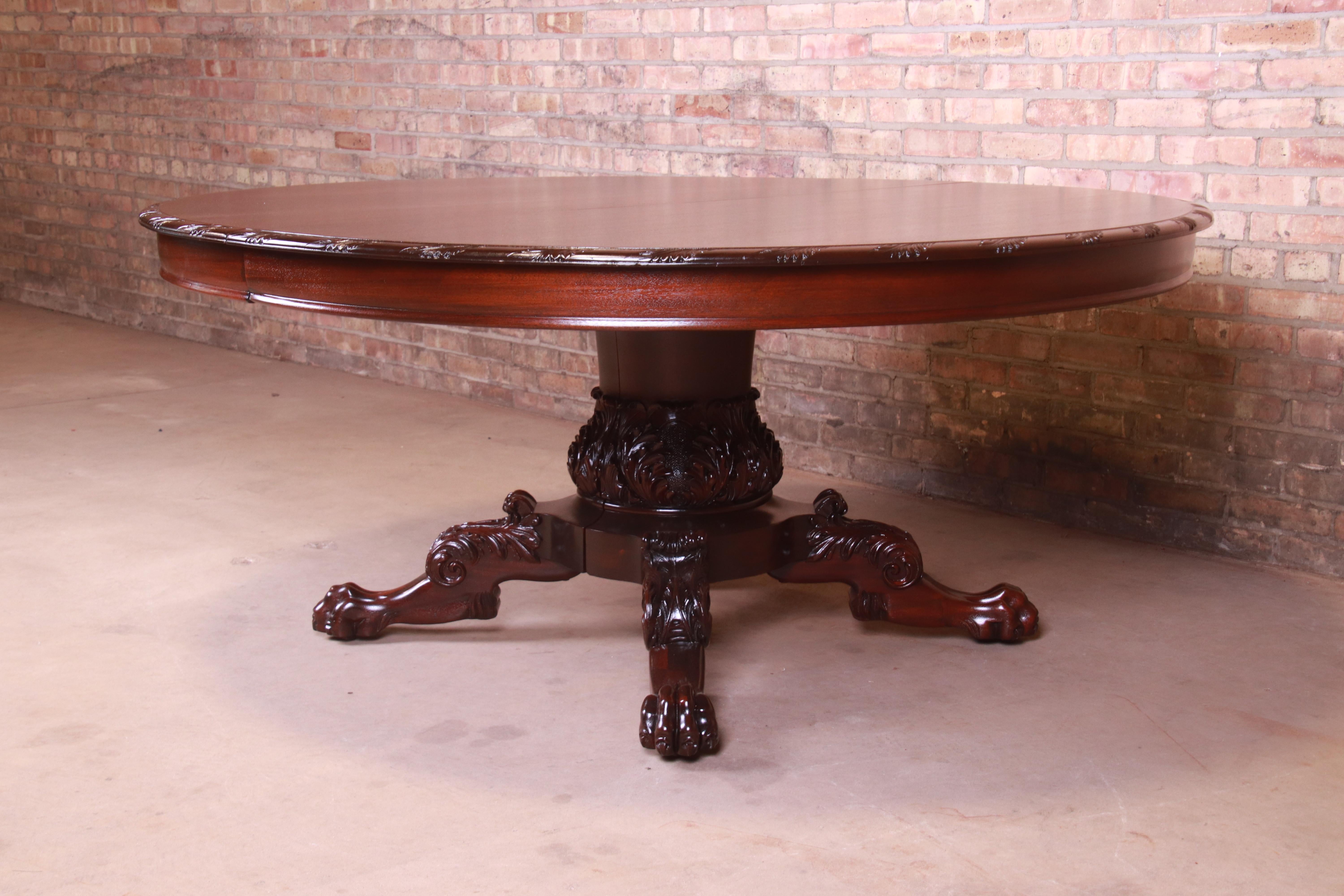 Monumental Victorian Carved Mahogany Dining Table with Seven Leaves, Refinished In Good Condition In South Bend, IN