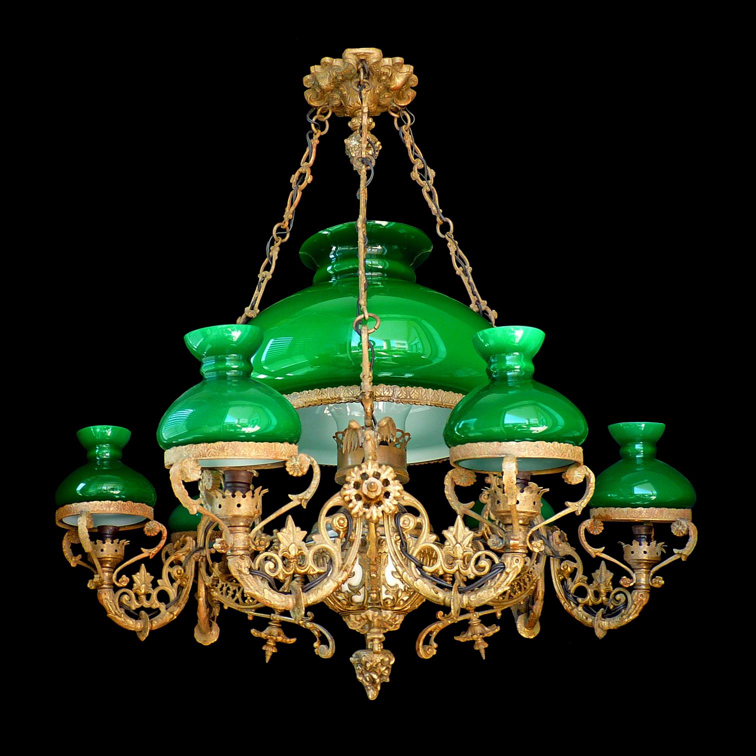Gorgeous monumental antique circa 1940 French Victorian 7-light bulbs chandelier with Opaline green cased glass and chiselled gilt bronze/ brass.
Measures:
Diameter 36 in / 90 cm
Height 40 in / 100 cm
Diameter glass shades 14 in (36 cm)/ 9 in (23