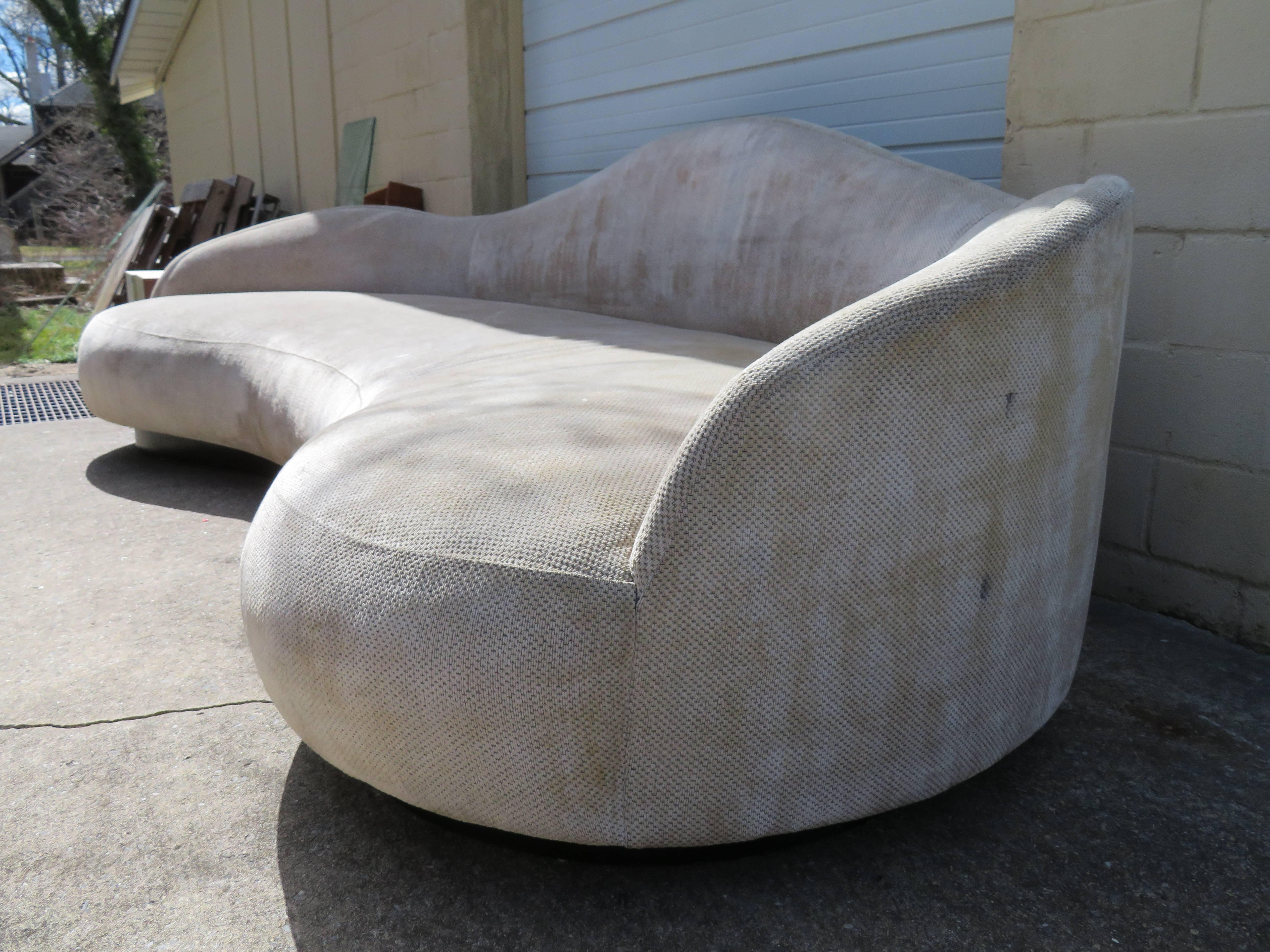 Monumental curved cloud sofa. This sofa is probably the largest sofa we have ever seen measuring a whooping 146