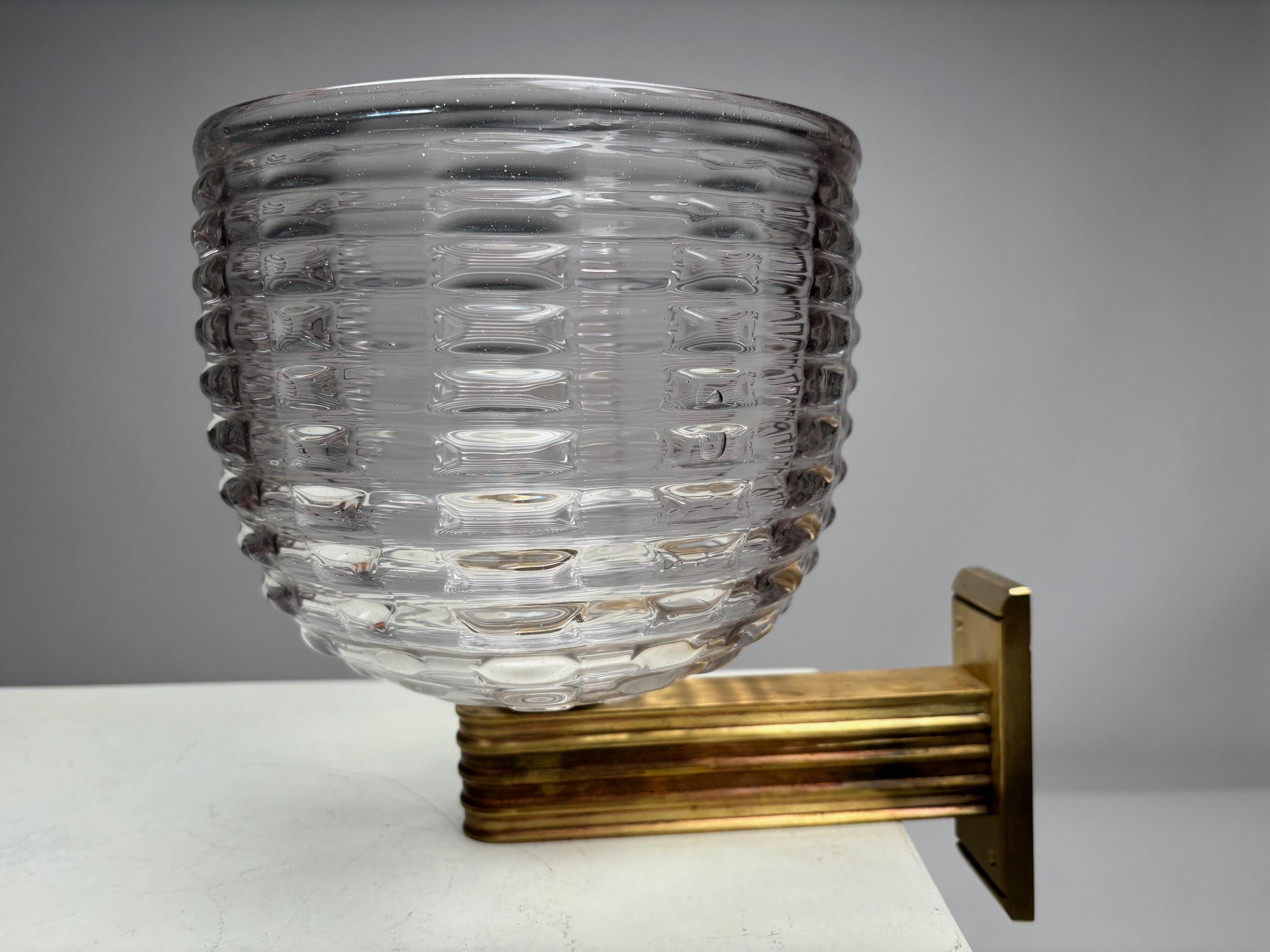 Monumental wall lamp by Ercole Barovier with a large Morano glass bowl and a fluted brass support. Italy