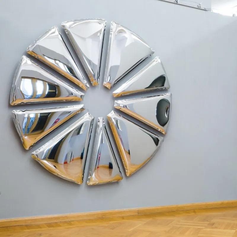 Nucleus wall sculpture by Zieta 

Stainless steel
Dimensions: 600 x 6 cm

Zieta is best known for his collection of stools “Plopp” made through the technologist FIDU. With the same principle Zieta Prozessdesign conceived mirror collections made