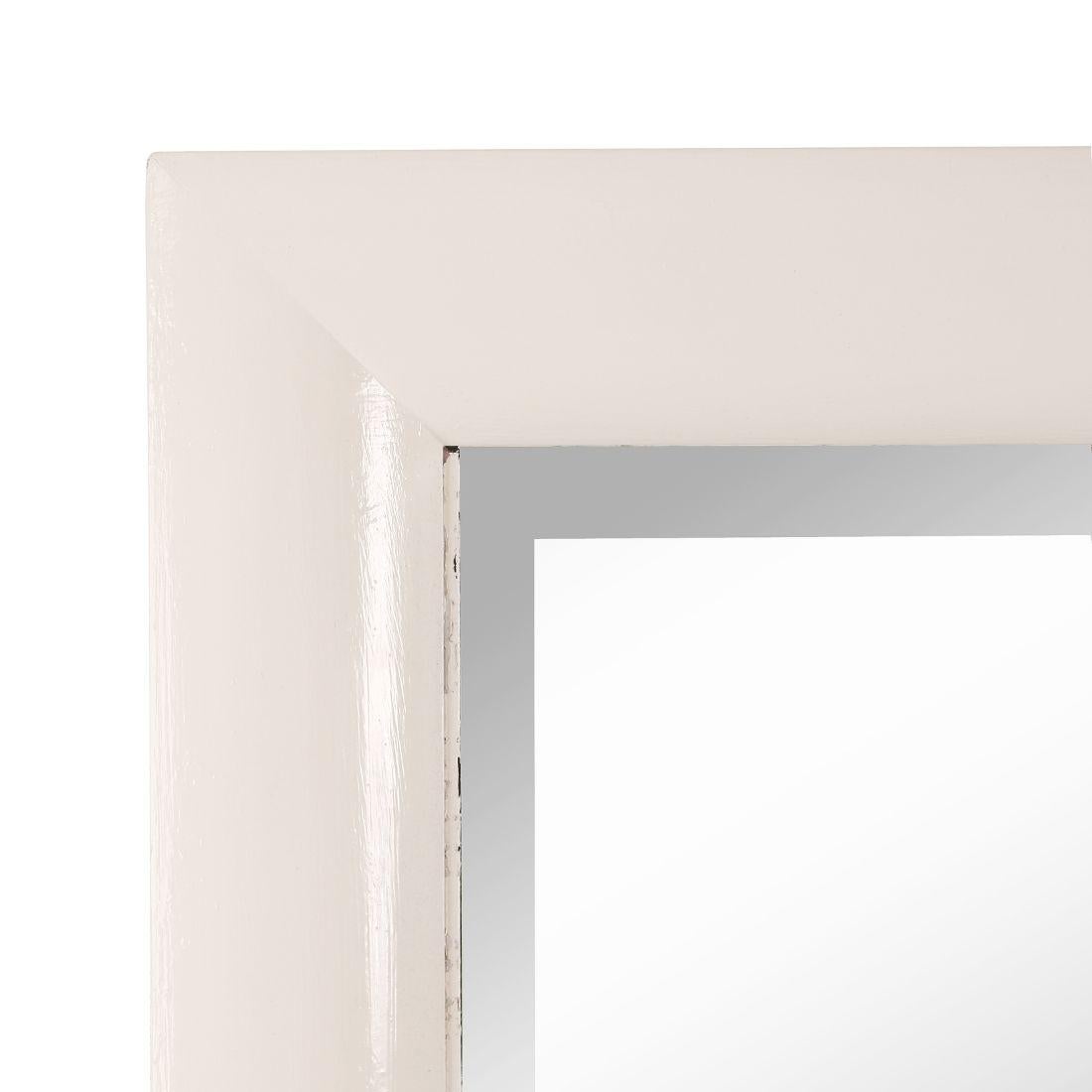 This Monumental White Rectangular Mirror features a bold and elegant design, perfect for making a statement in any room. The large, clean-lined rectangular frame is finished in a sophisticated white, which highlights the mirror's sleek and modern