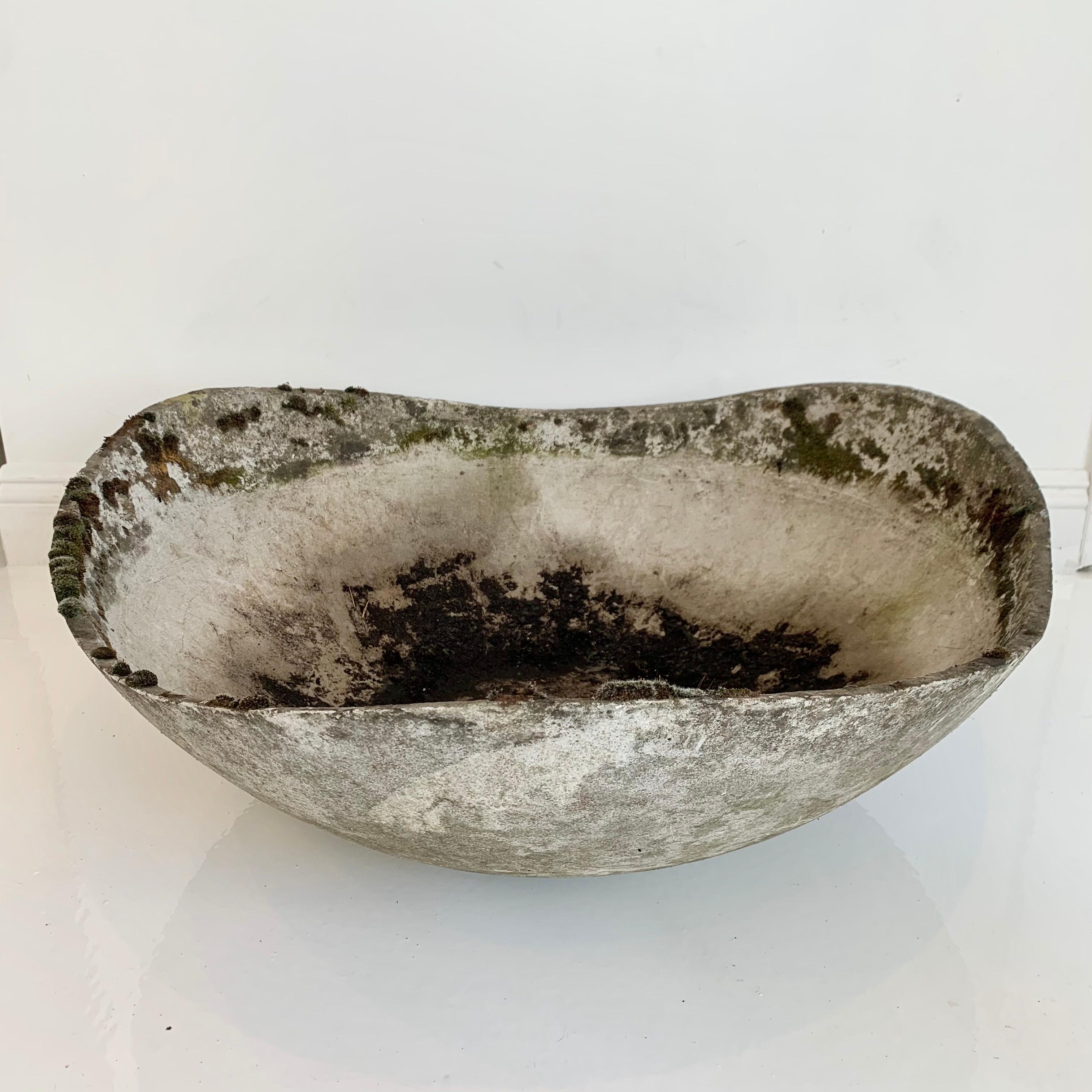Gigantic curved biomorphic cement bowl by Swiss architect Willy Guhl for Eternit. Great scale and unique shape. Good condition. Extremely rare size and shape. two available. Priced individually. 



  