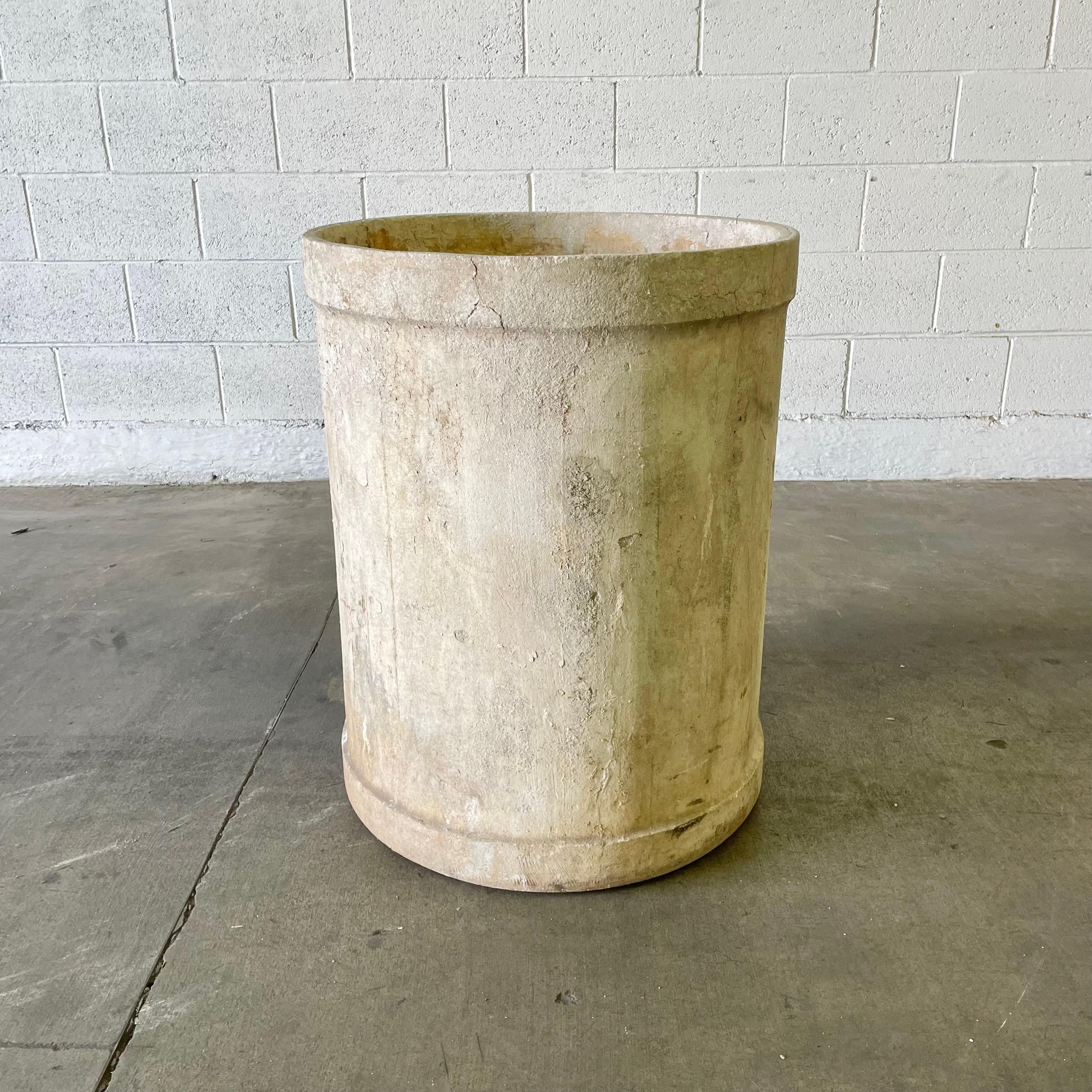 Rare monumental concrete tree planter by Willy Guhl. Cylindrical bin with lip. Extremely heavy and sturdy. This piece has a fantastic patina and texture. Substantial piece great for any back yard or patio. Only one available.

