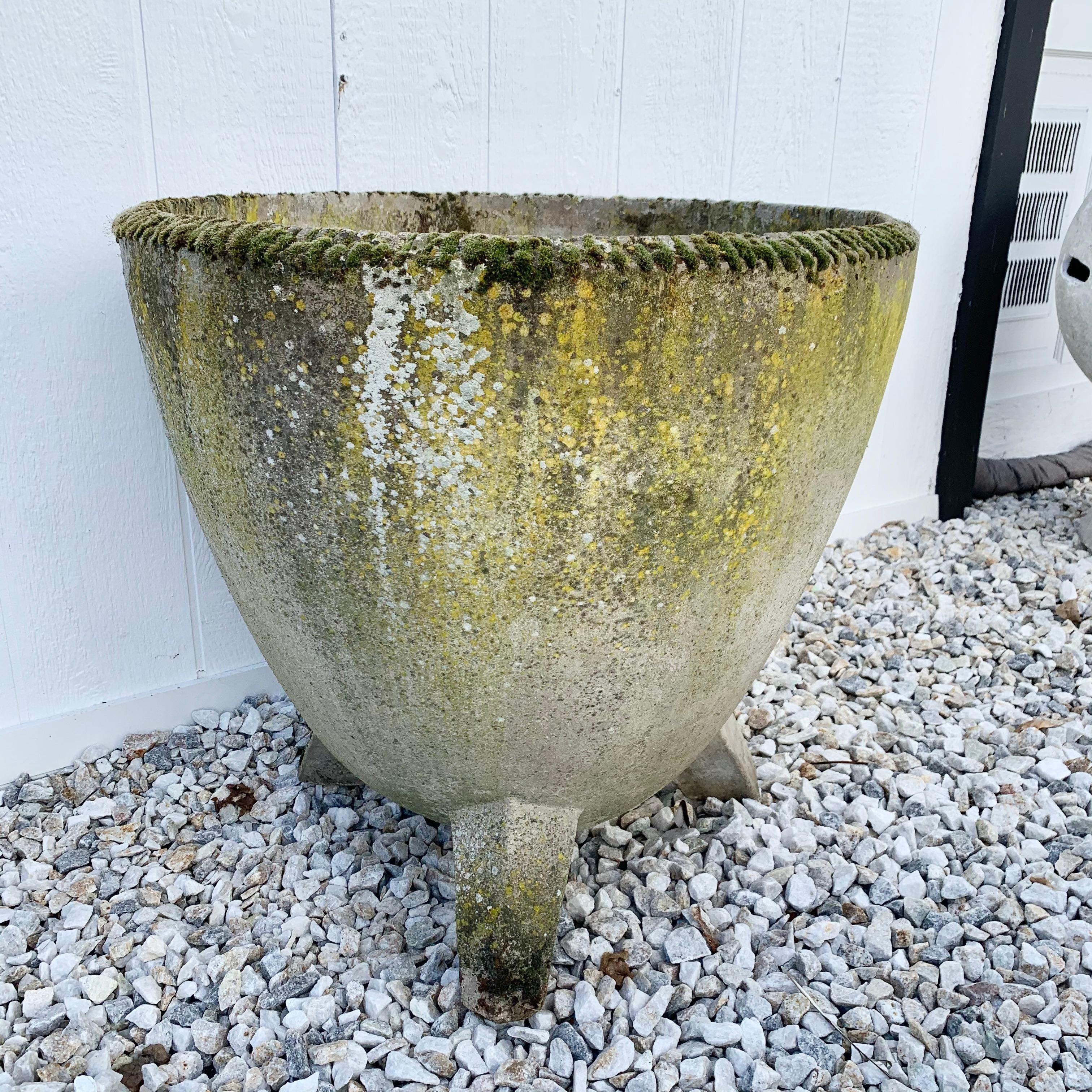 Gigantic concrete planters by Willy Guhl for Eternit. Heightened bowl with a three legged base. Teeth ridges along the upper rim. Great patina and condition. Factory markings. Super unique shape. Four available. Priced individually. 

 


   