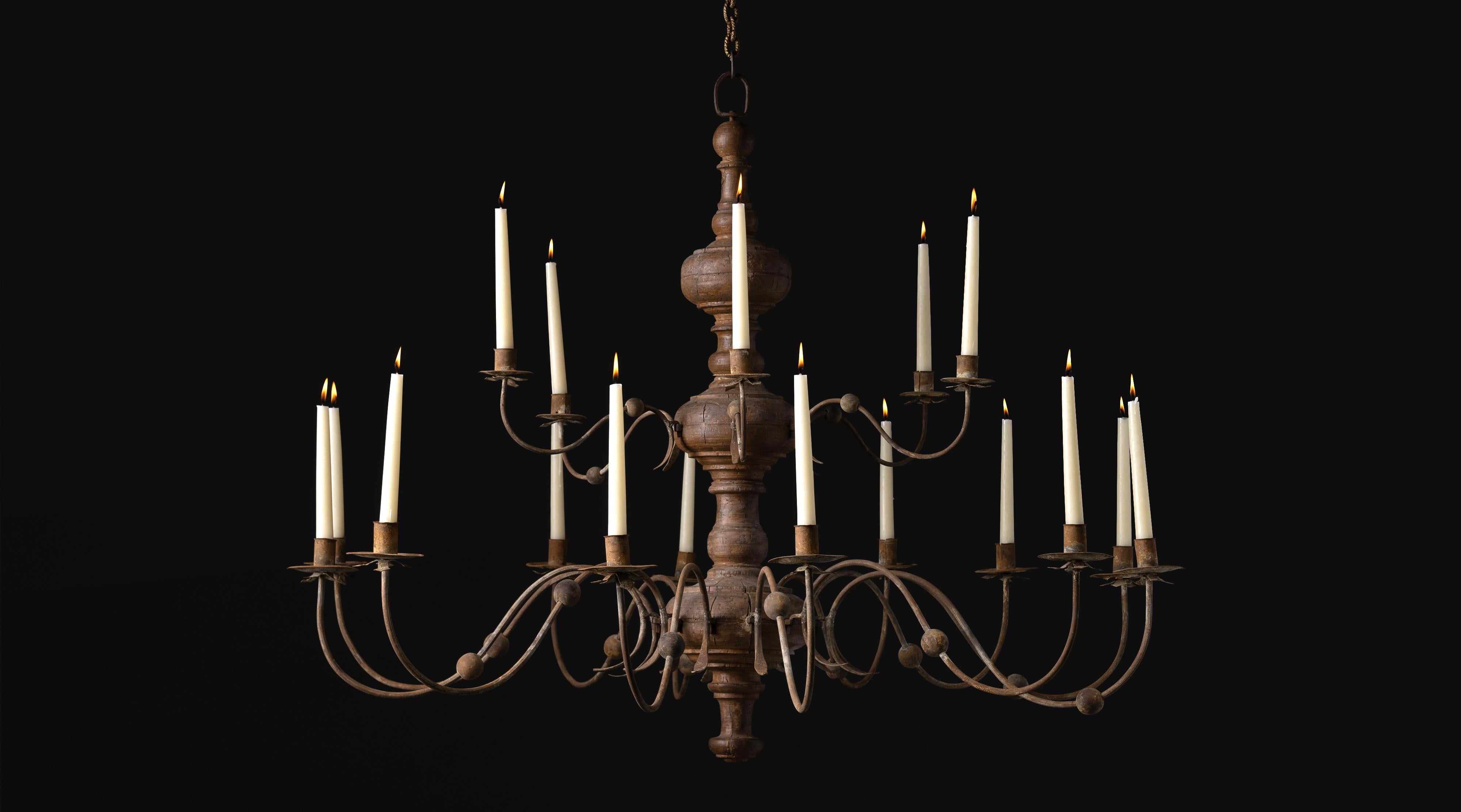 Monumental Wooden Candelabra, Italy circa 1840

Large chandelier with wooden spindle and 18 curved iron arms

Measures 48”dia x 25”H.