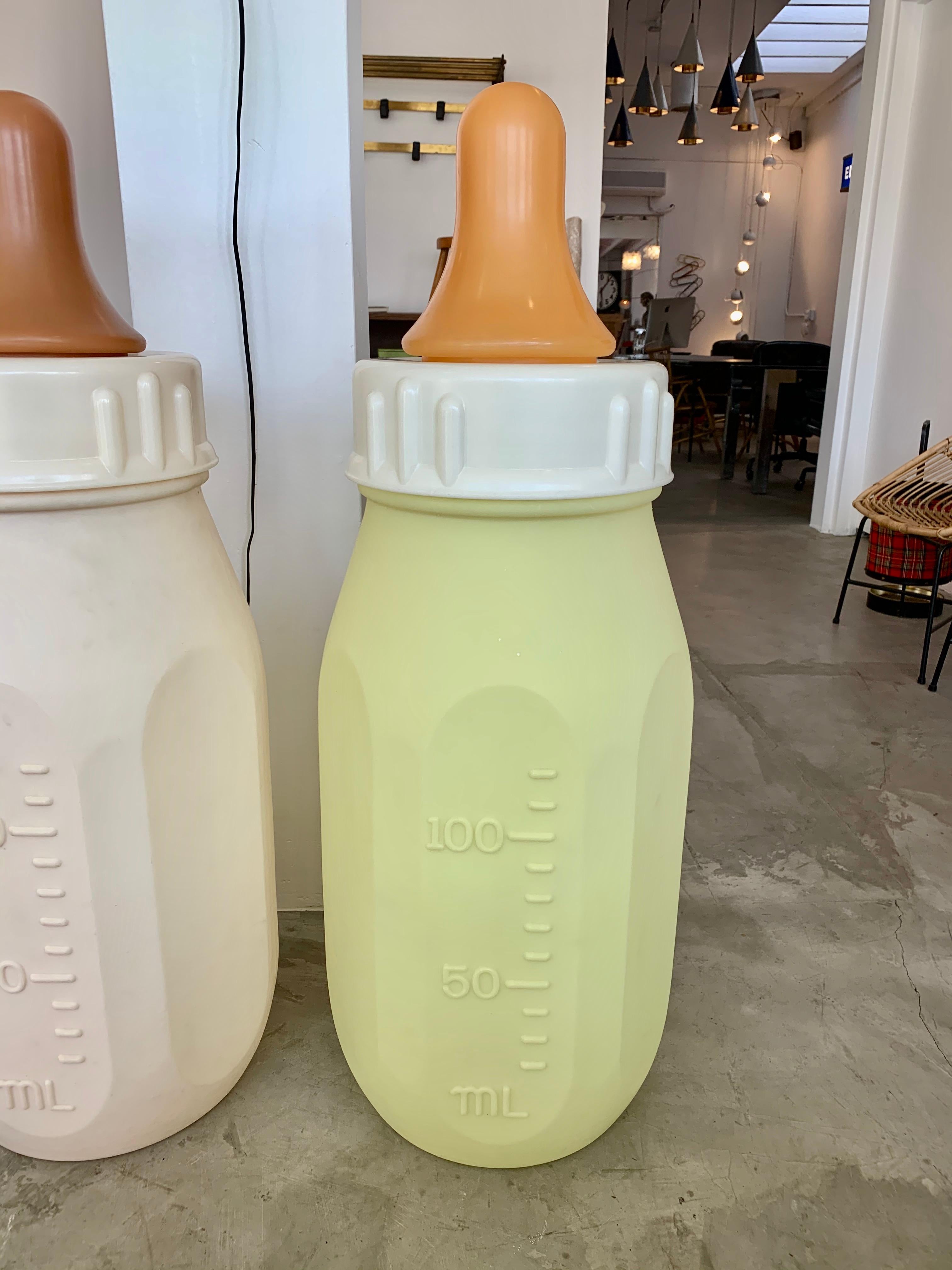 Hand-Carved Monumental Yellow Baby Bottle For Sale