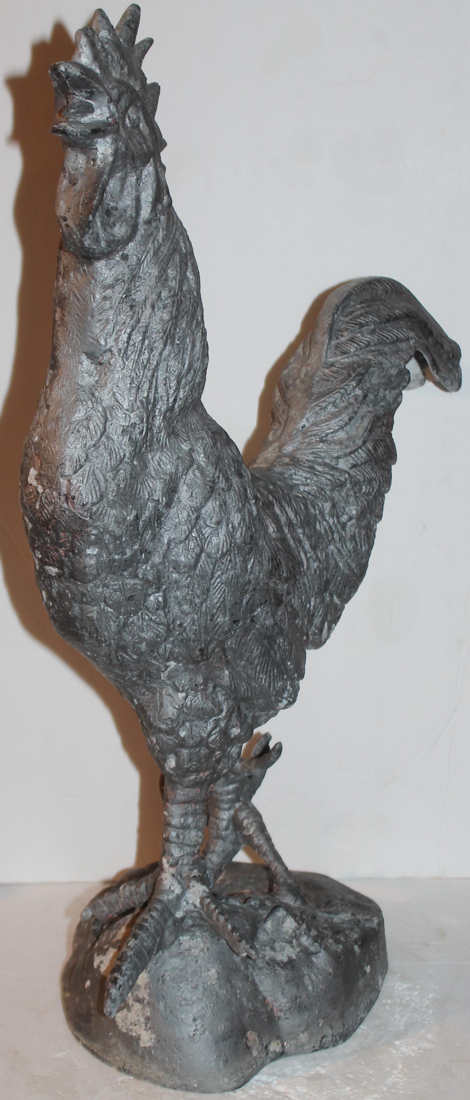 This fantastic zinc rooster looks like its from a garden or a farm. Fantastic porch or window ornament. Great country look.