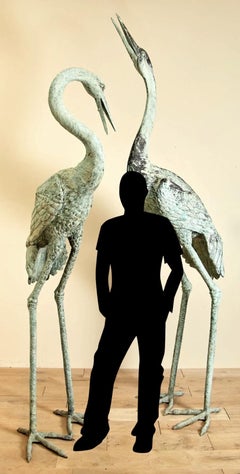 Paire de grues monumentale en fonte de fer  -  2.70 et 2.25 mètres