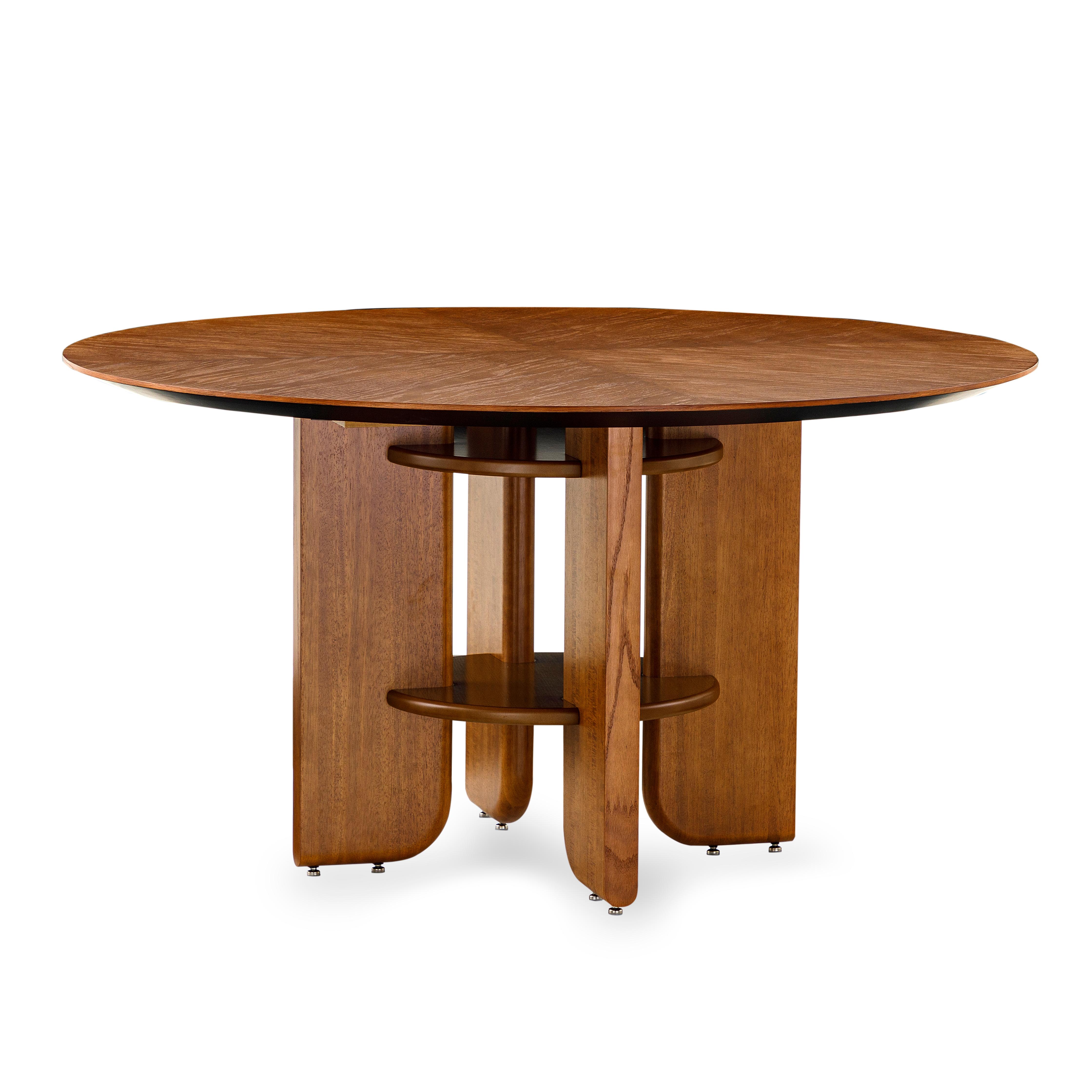This round dining table in an almond oak veneered top finish with oak wood legs is the perfect table for your house. Every dining space needs a good dining table and the Moon round table is going to be perfect for that space, with an exclusive