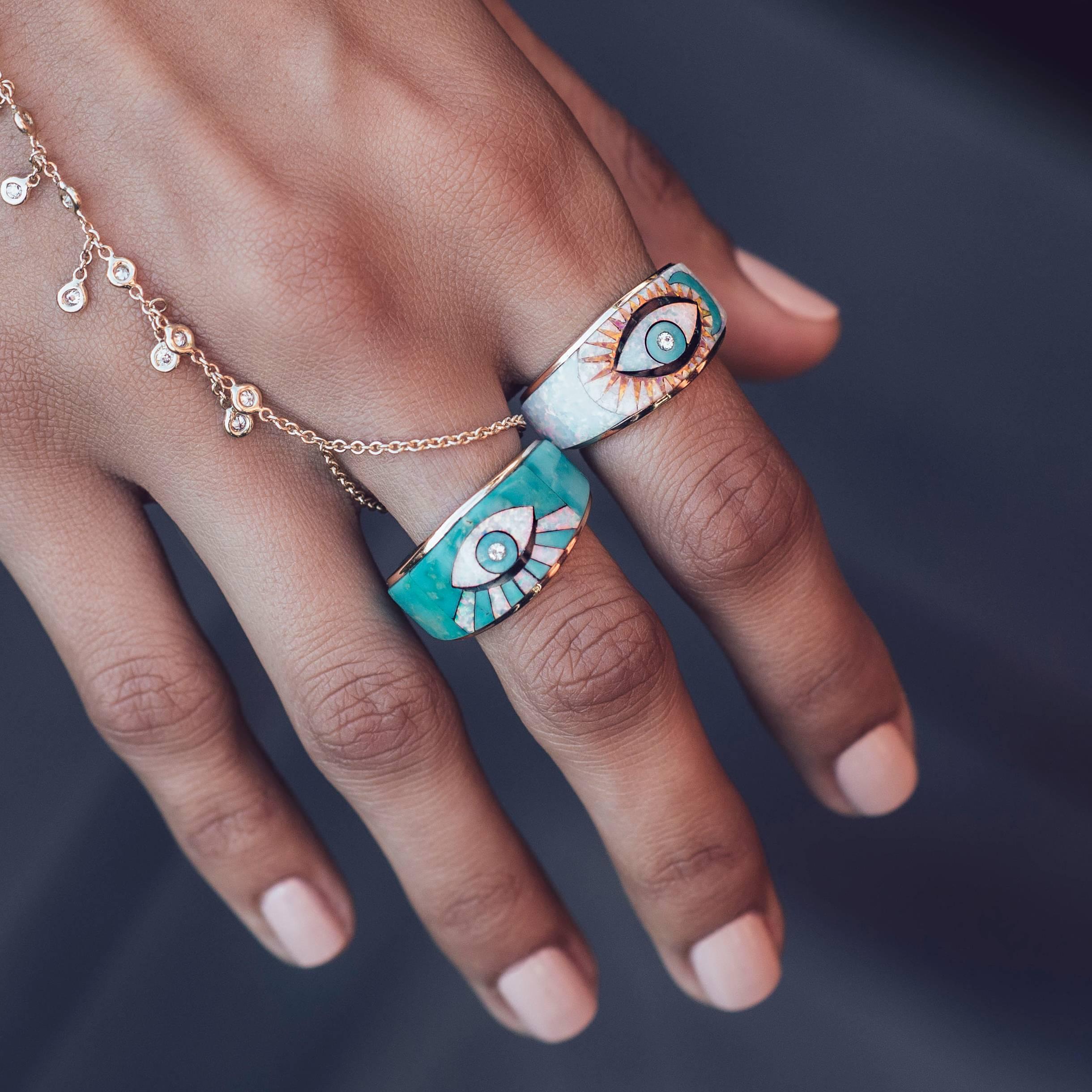Opal, Onyx and Turquoise inlay Moon + Eye ring with diamond accents. Available in 14k Yellow, Rose or White Gold. 
The eye acts as a protector and good luck charm for its beholder.