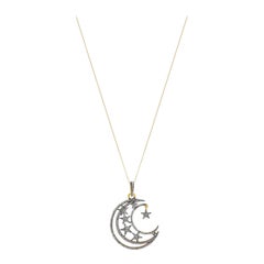 Pendentif en diamants avec lune et étoiles