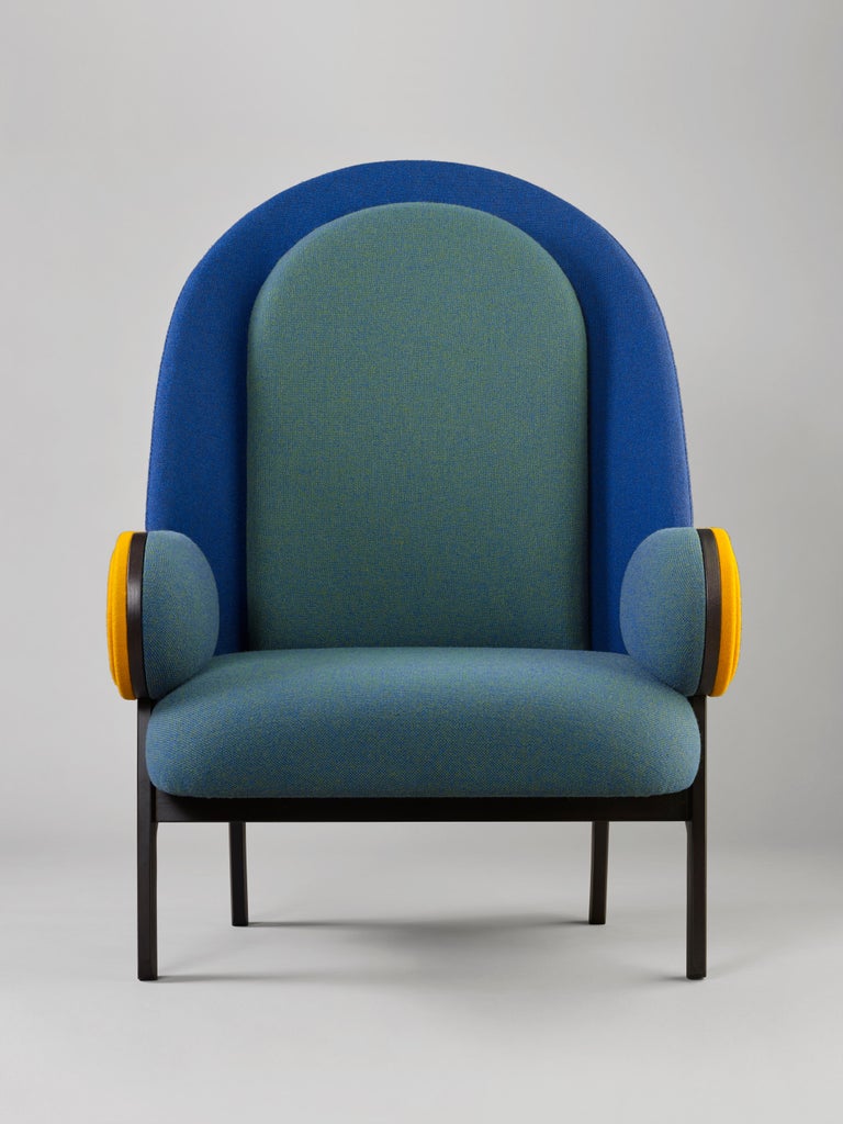 By French Lebanese designer Charles Kalpakian, 'Moon' is a contemporary armchair with a vintage twist in Kvadrat upholstery. Its very high back and its unusual width and depth (80 cm both) make it particularly welcoming and comfortable. Pricing is