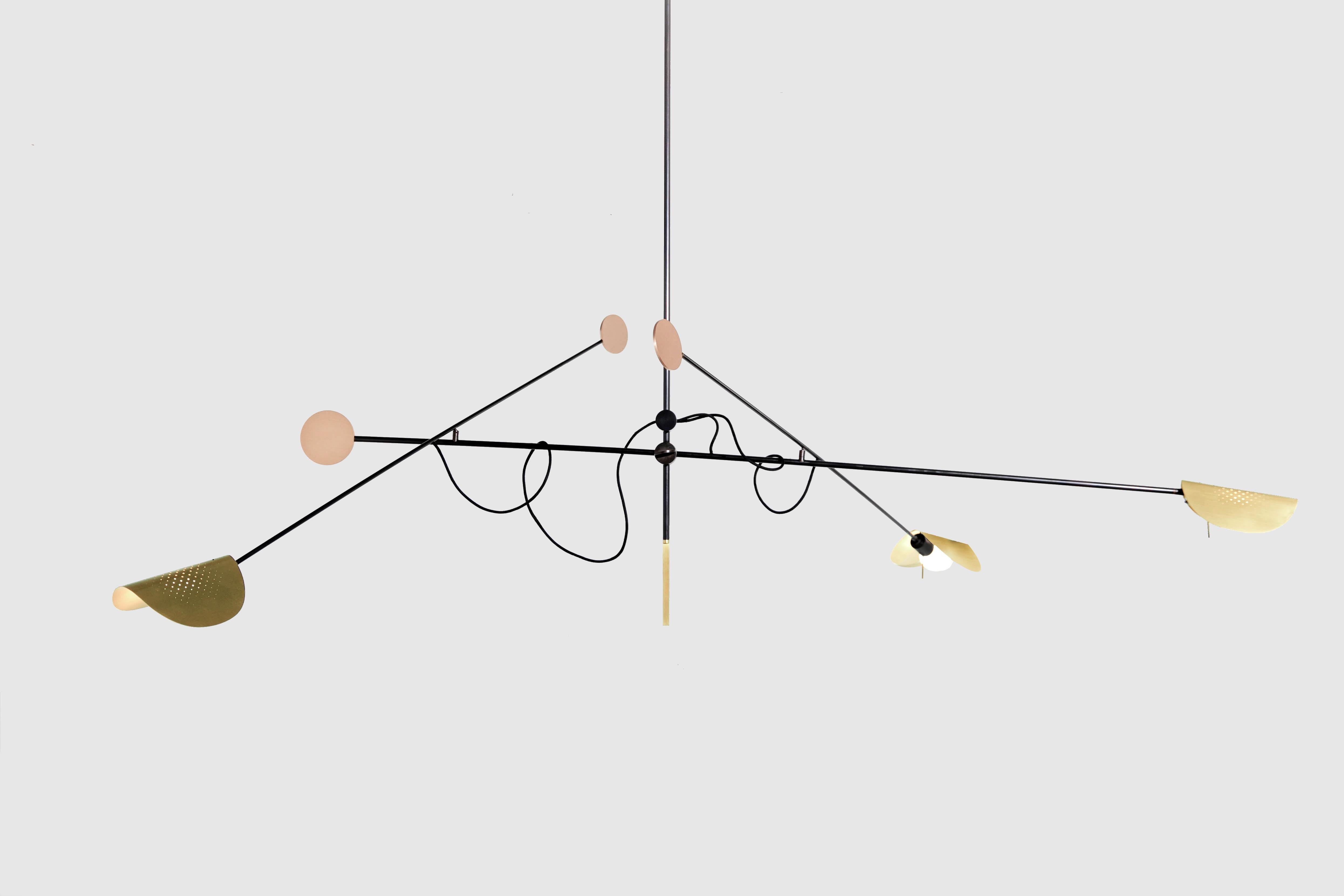 Moon chandelier by SB26
Dimensions: L 208 x W 128 x H 141 cm
Materials: Steel, copper, brass gilded with pure gold

Moon is balanced in space and refined to its worked ends which gives it bright and colorful reflections.
This reader plays also