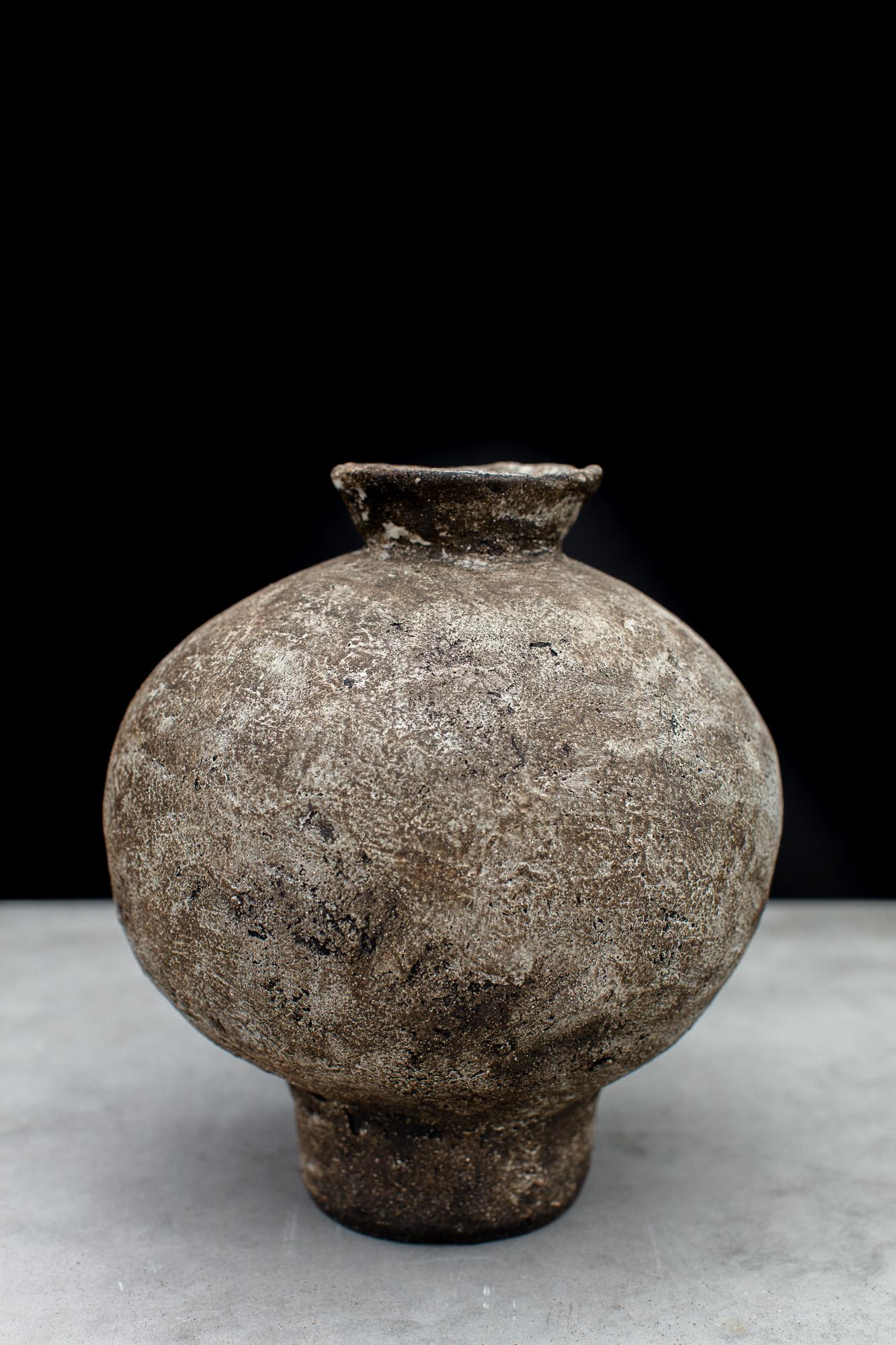 Mugly NYC is a Brooklyn based ceramic studio specializing in richly textured sculptural clay and porcelain that evoke the poetics of the handmade.

This Moon Jar was handmade in 2022 with highly textured sculpture clay and porcelain slip, the