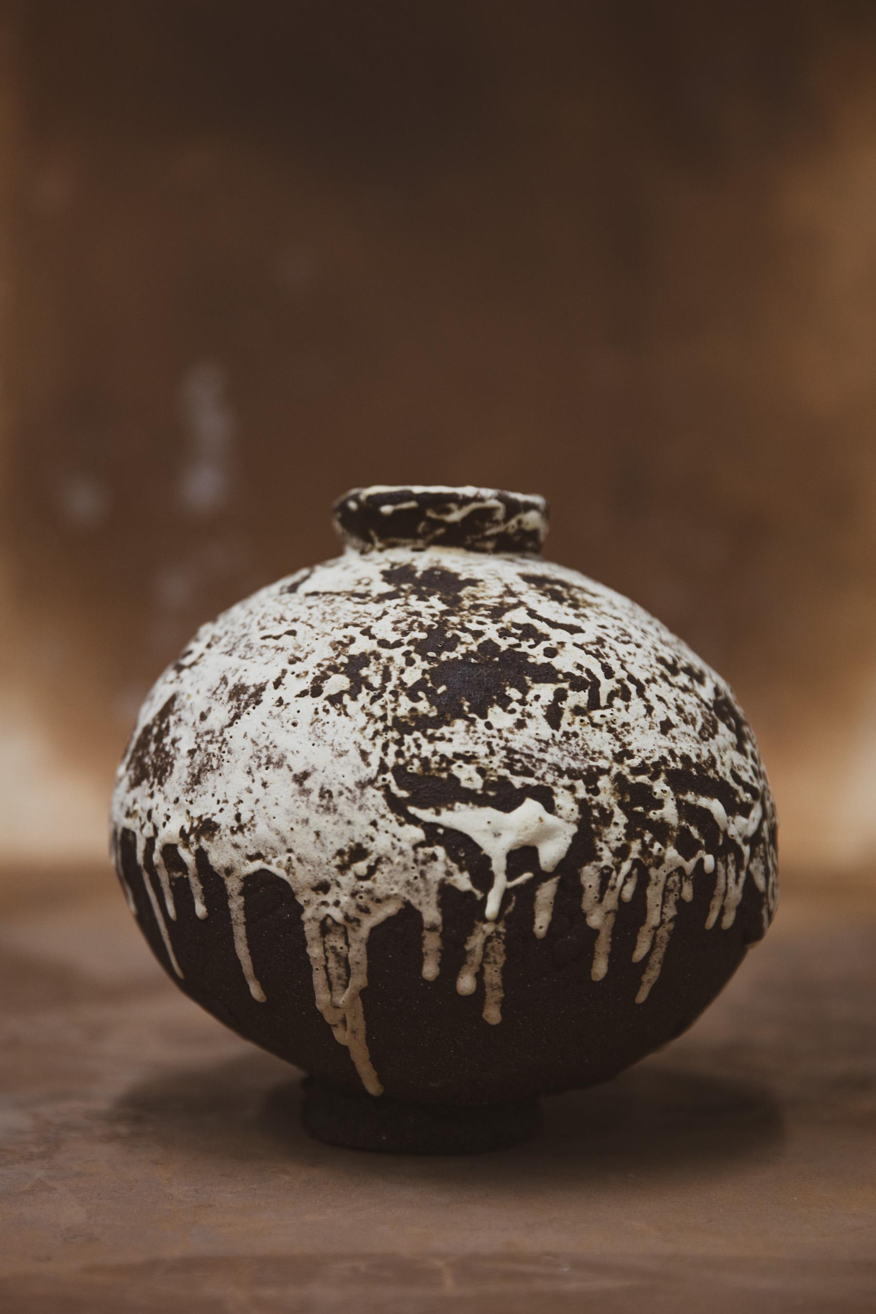 Made with highly textured sculpture clay this jar’s surface is decorated with a salvaged stone dust and wild clay glaze blend. 
Approximate dimensions 8