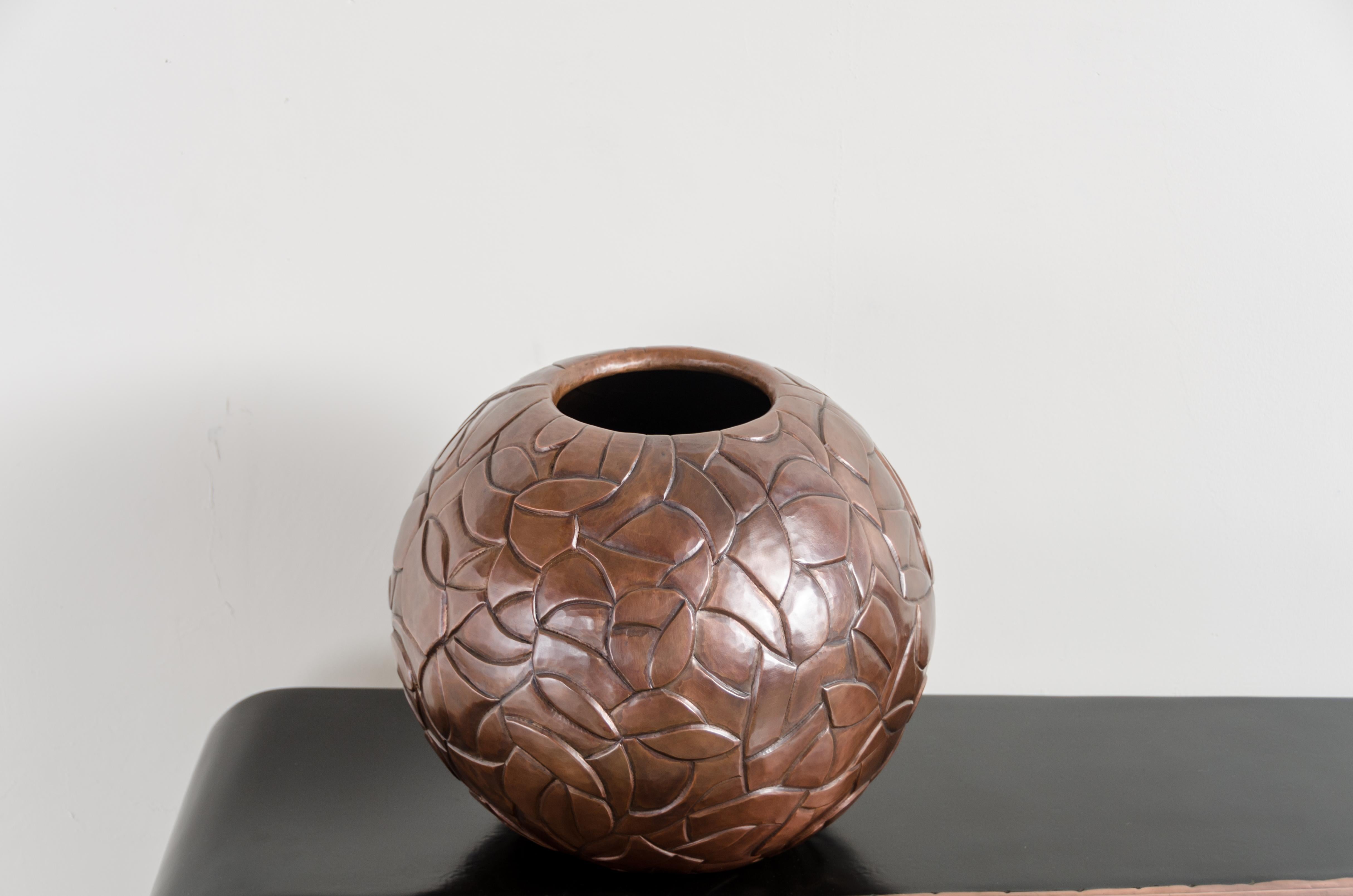 Moon Jar w/ Chuan Design 
Antique Copper
Hand Repousse
Limited Edition

Repoussé is the traditional art of hand-hammering decorative relief onto sheet metal. The technique originated around 800 BC between Asia and Europe and in Chinese