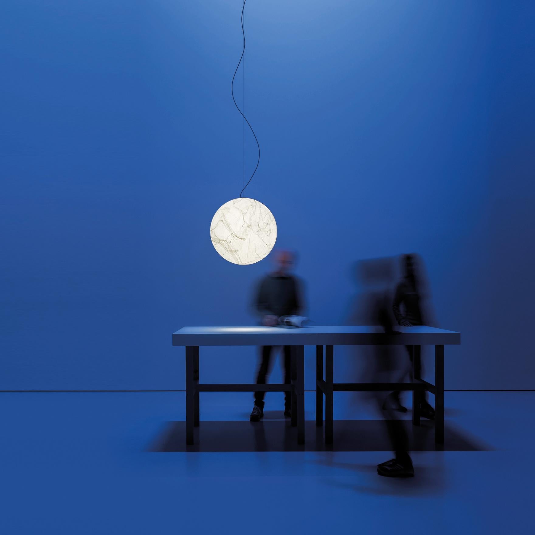 Moon was created from the dream of bringing the moon inside your own home.
The hand-made Japanese paper surface makes every lamp unique. 
Table and floor version available.

Diameter 47.24