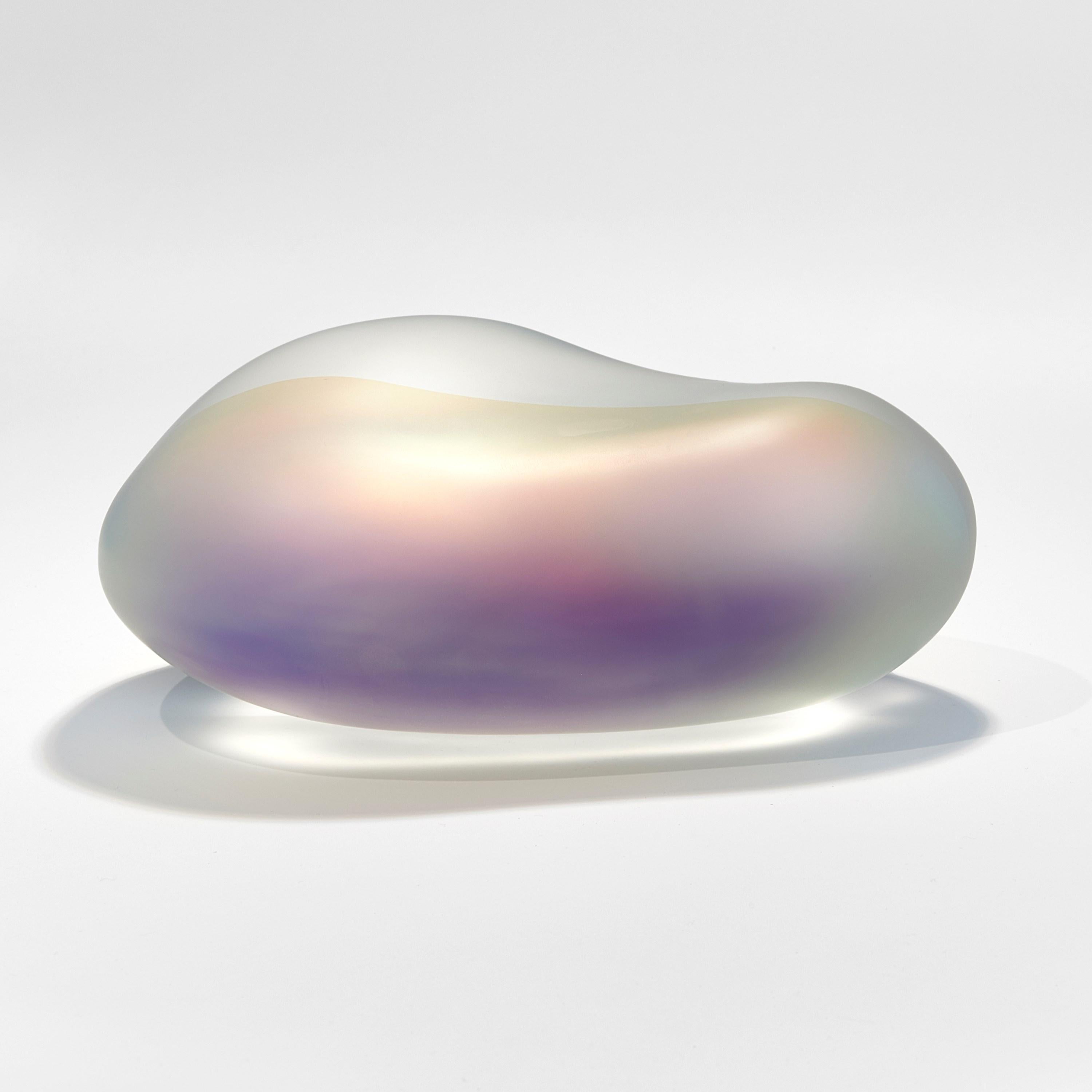 'Moon-rock 010' is a unique sculpture by the British artist, Jon Lewis, created from cast glass with dichroic filters. 

Lewis’ first introduction to glassmaking was in 1989 at Wolverhampton University, where he instantly fell in love with glass as