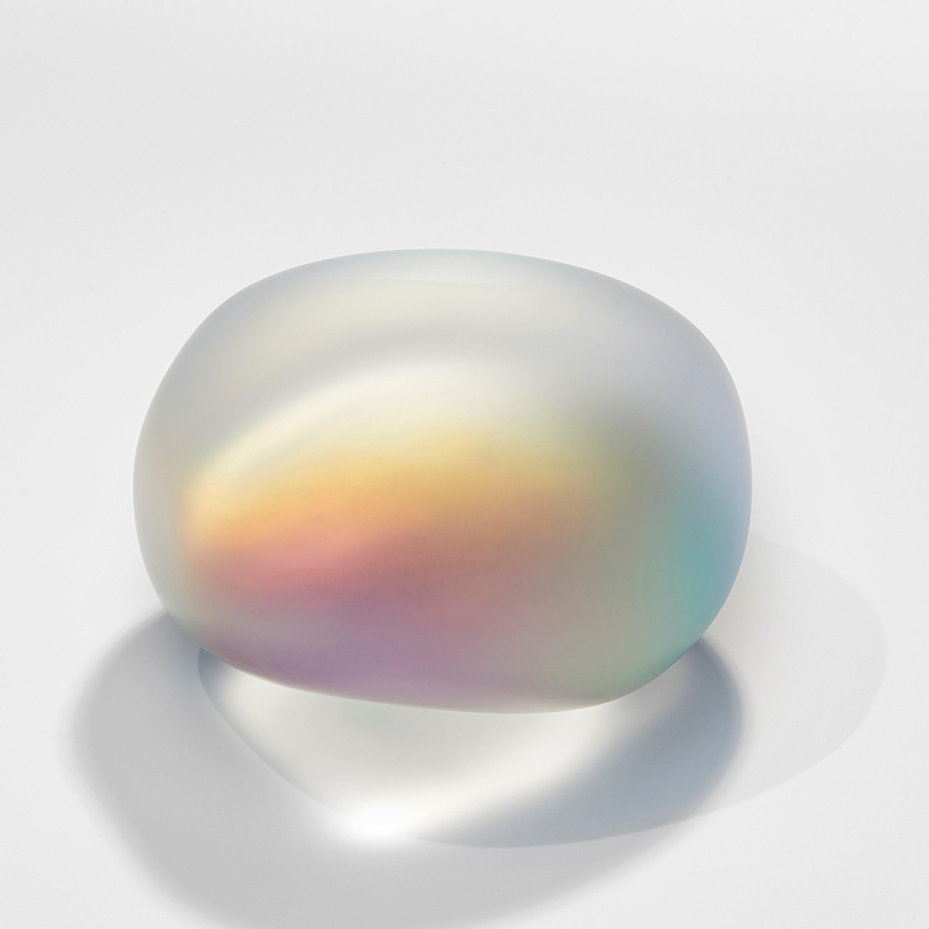 'Moon-rock 011' is a unique sculpture by the British artist, Jon Lewis, created from cast glass with dichroic filters. 

Lewis’ first introduction to glassmaking was in 1989 at Wolverhampton University, where he instantly fell in love with glass as