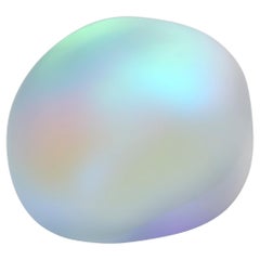 Moon-rock 018, una scultura in vetro trasparente e pellicola dicroica di Jon Lewis