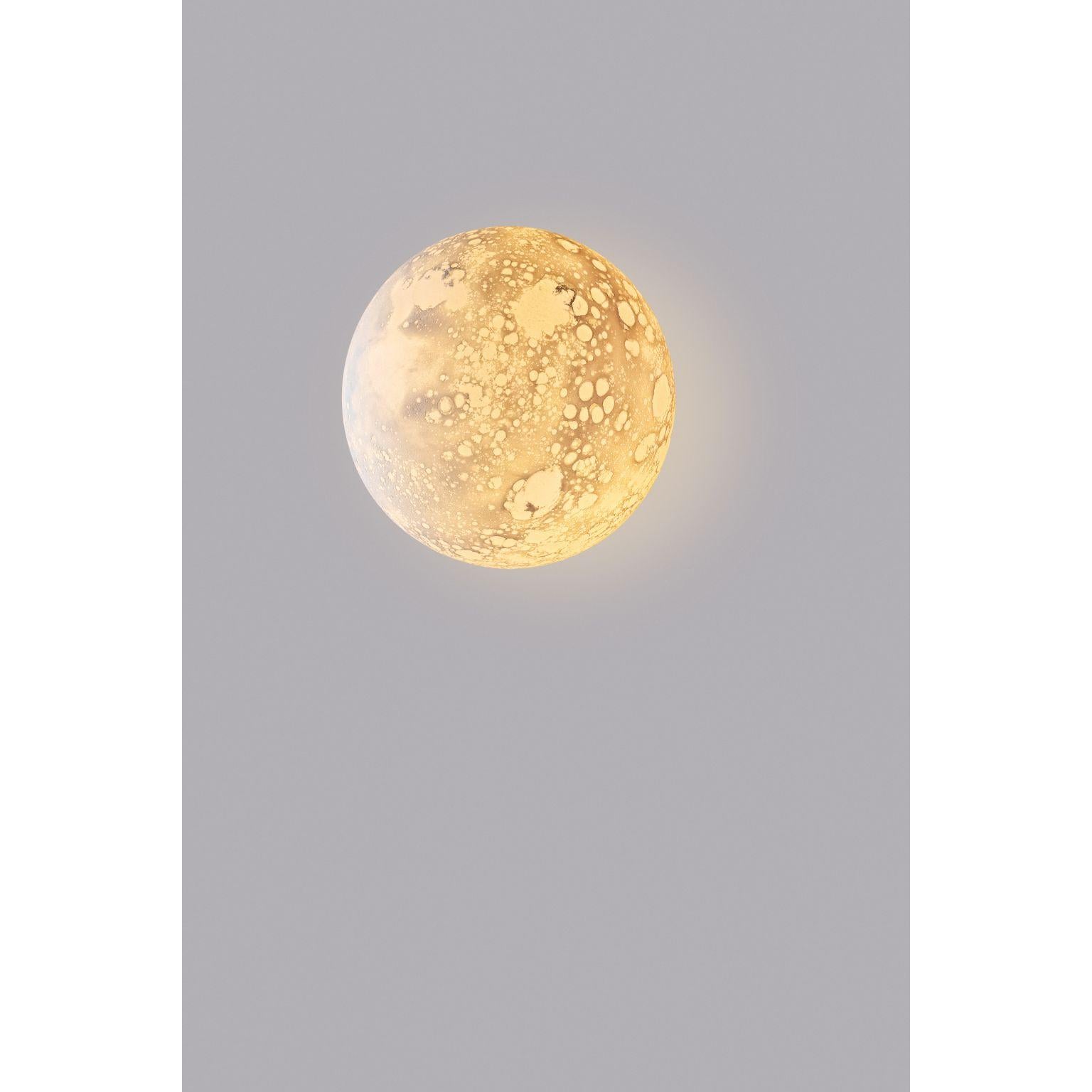 Moon sconce by Ludovic Clément d’Armont
Materials: Blown Glass, sculpted by Ludovic Clément d'Armont
Dimensions: 25x25x25 cm

All our lamps can be wired according to each country. If sold to the USA it will be wired for the USA for