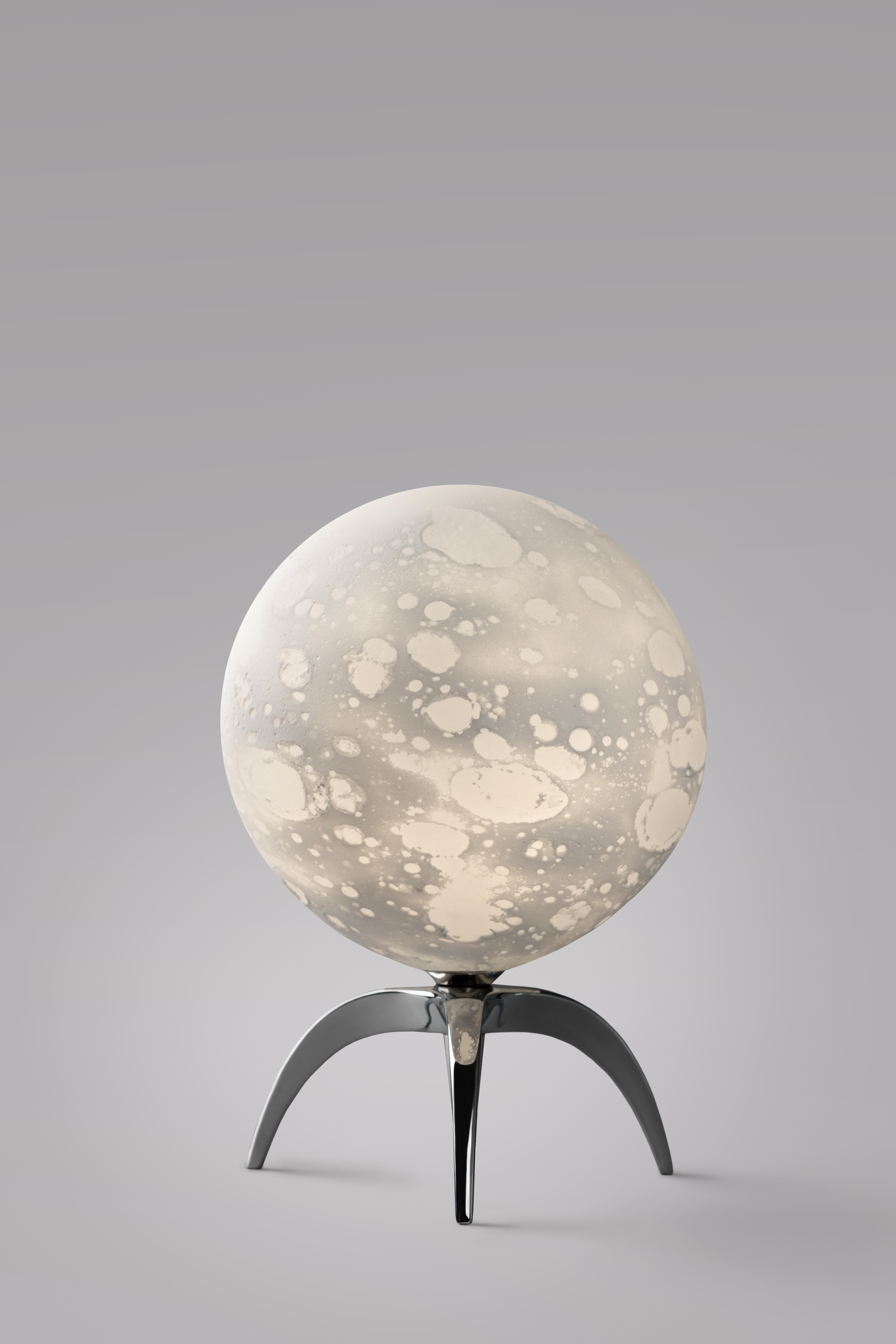 Moon sculpted table lamp, Ludovic Clément d’Armont
Blown glass and brass
Dimensions: 20 x 14 x 14 cm

Ludovic Clément d’Armont is in the continuation of a family tradition of centuries of gentle glassmakers, painters, carpenters and artists.