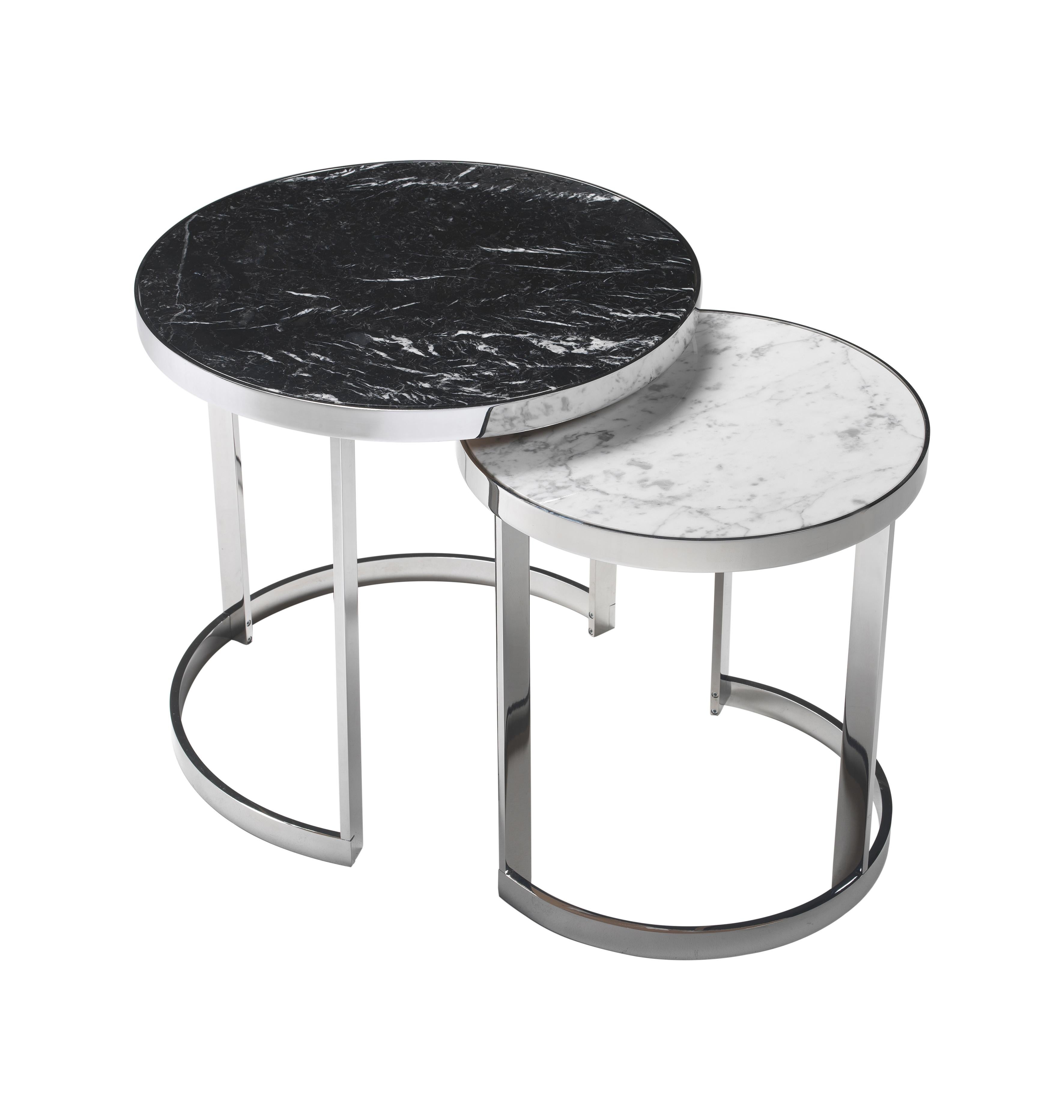 Moon modern Italian set of two side tables (diameter 50 cm and diameter 40 cm) with metal chrome base and special marble top (Carrara and black Marquinia marbles).

Please note: Prices do not include VAT. VAT may be added depending on the ship-to