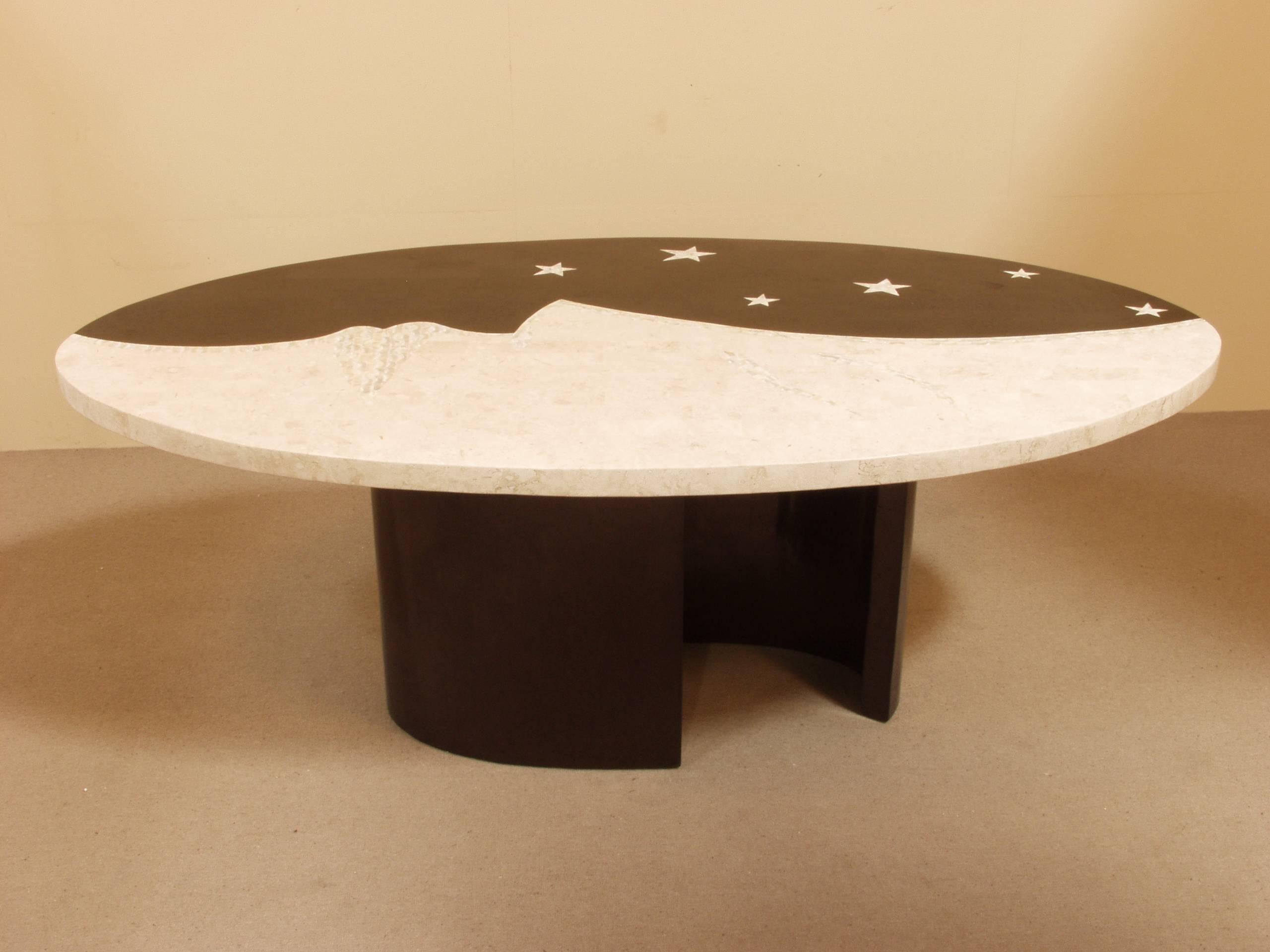 Whimsical dining table with half moon and stars inlaid into top. Table covered in tessellated white and black stone, accented with trocca seashell inlay.

All furnishings are made from 100% natural Fossil Stone or Seashell inlay, carefully hand cut