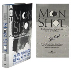 Shot de lune, par Alan Shepard et Deke Slayton, signé par Shepard, première édition
