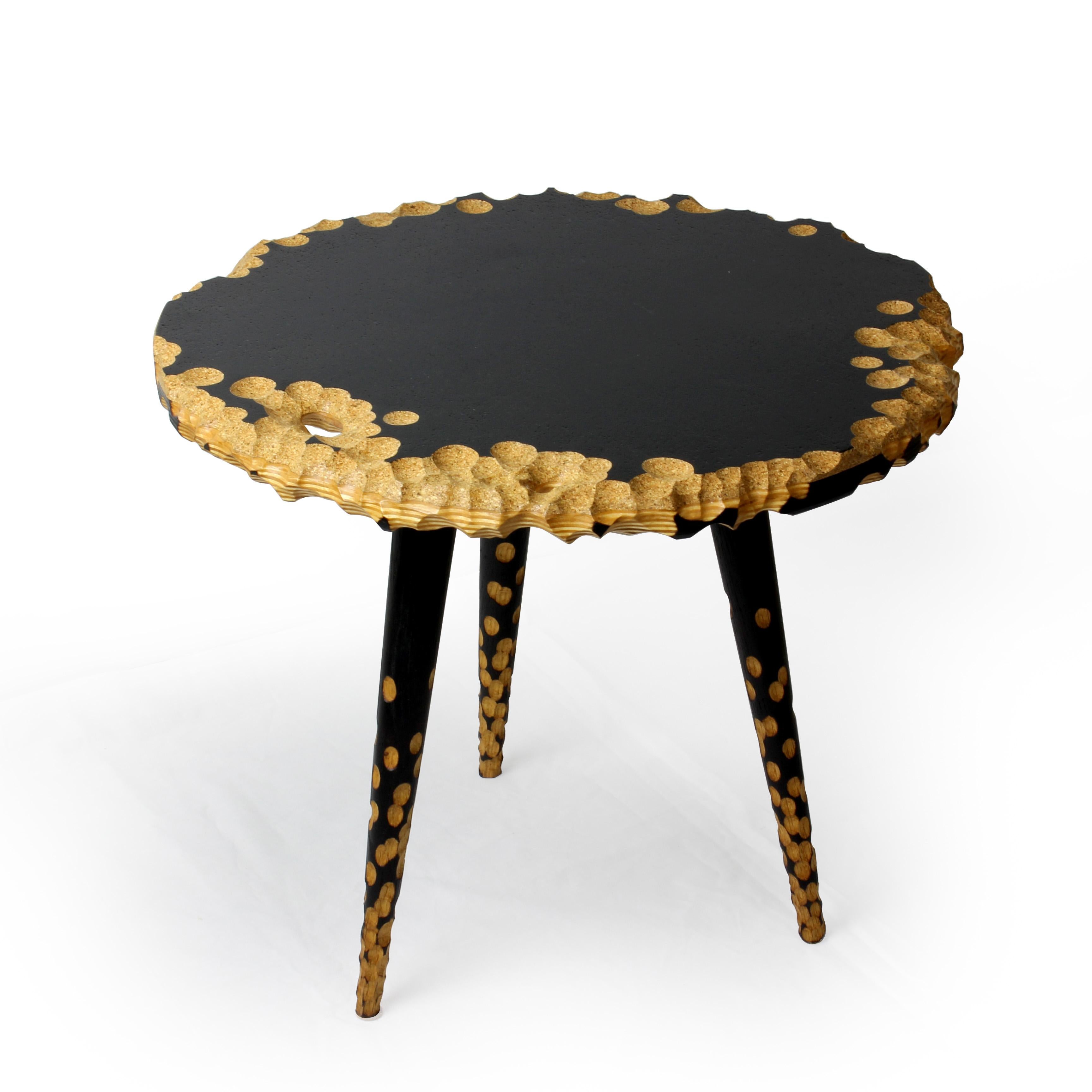 Moon Side Table by Gabor Gobi
Unique Piece.
Dimensions: D 43 x W 43 x H 37 cm.
Materials: Beech wood, plywood, and cork.

This bespoke bedside table is crafted from repurposed real wood and cork. The wood has been charred using the Yakisugi