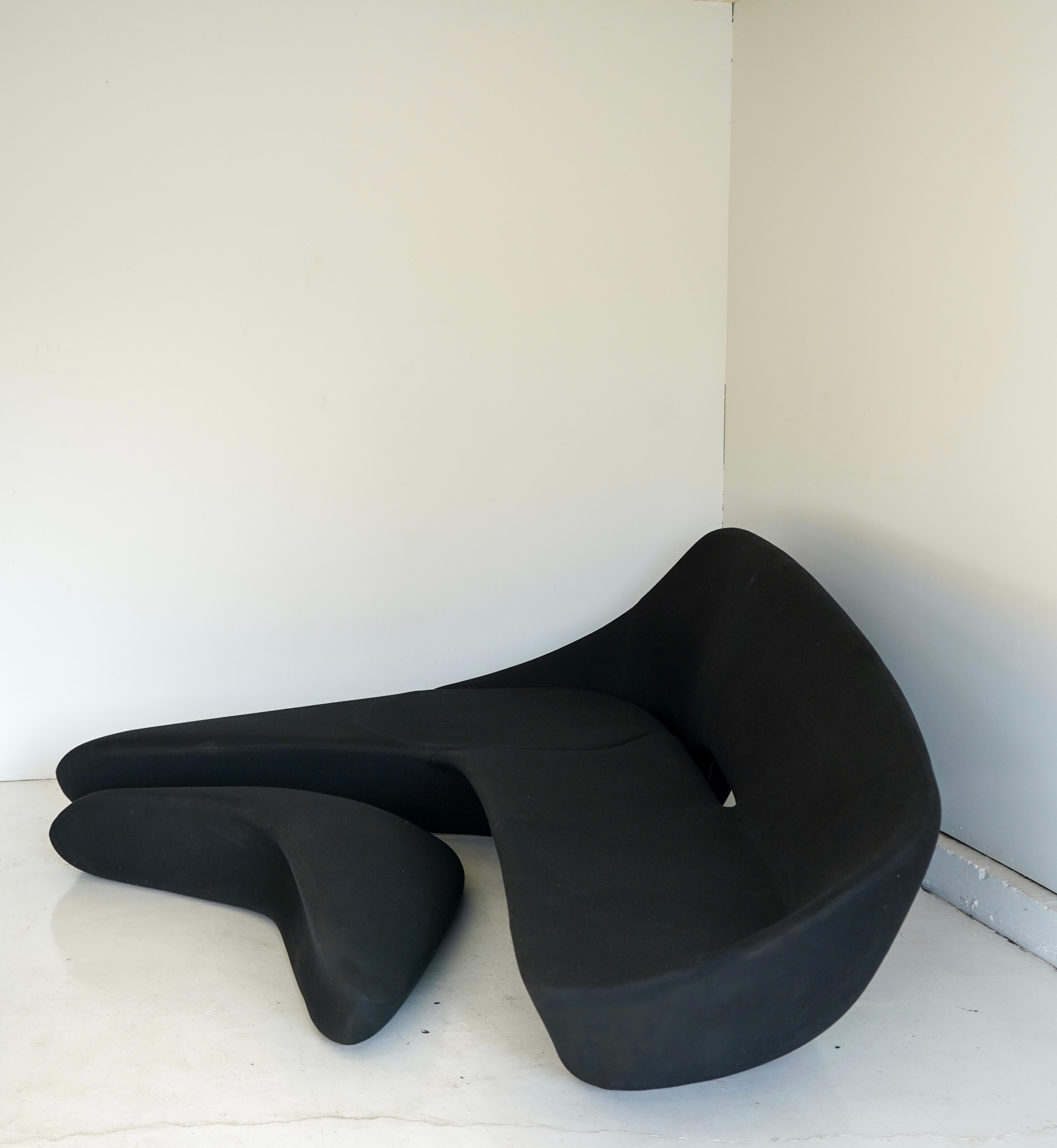 Moon sofa and ottoman by trailblazing Iraqi architect Zaha Hadid. Featuring all the swooping drama and undulating curves Hadid’s buildings became iconic for, this set also features an ottoman that perfectly nests into the lower portion of the sofa.