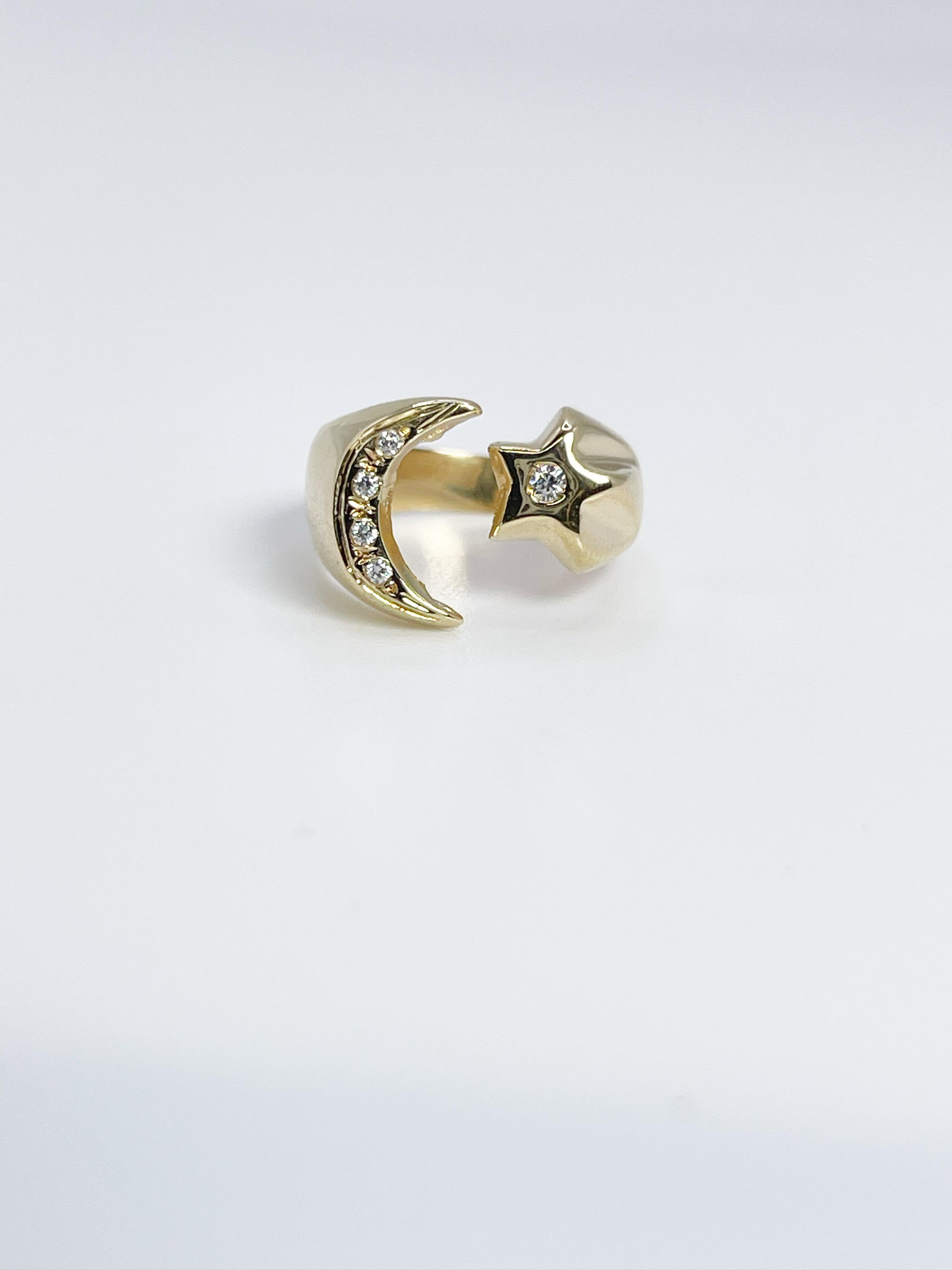 Simple moon and star ring in 18KT yellow gold made with CZ stones.

GRAM WEIGHT: 3.63gr
GOLD: 18KT yellow gold
SIZE: 5

WHAT YOU GET AT STAMPAR JEWELERS:
Stampar Jewelers, located in the heart of Jupiter, Florida, is a custom jewelry store and