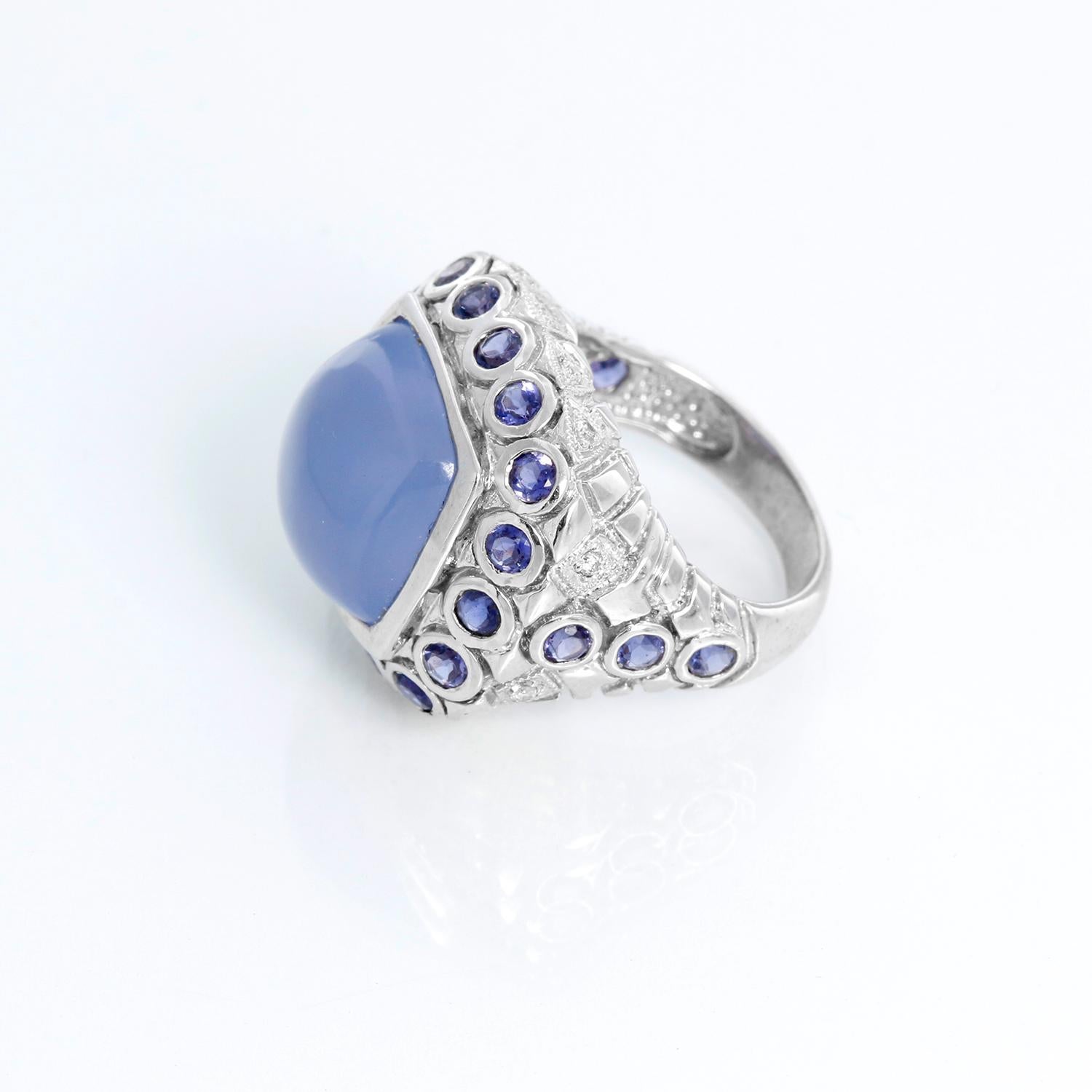 Moon Stone & Sapphire Ring Size 5 - White gold ring with a cabochon Moon stone surround by synthetic Sapphires and diamonds. Size 5. This is the perfect cocktail ring .