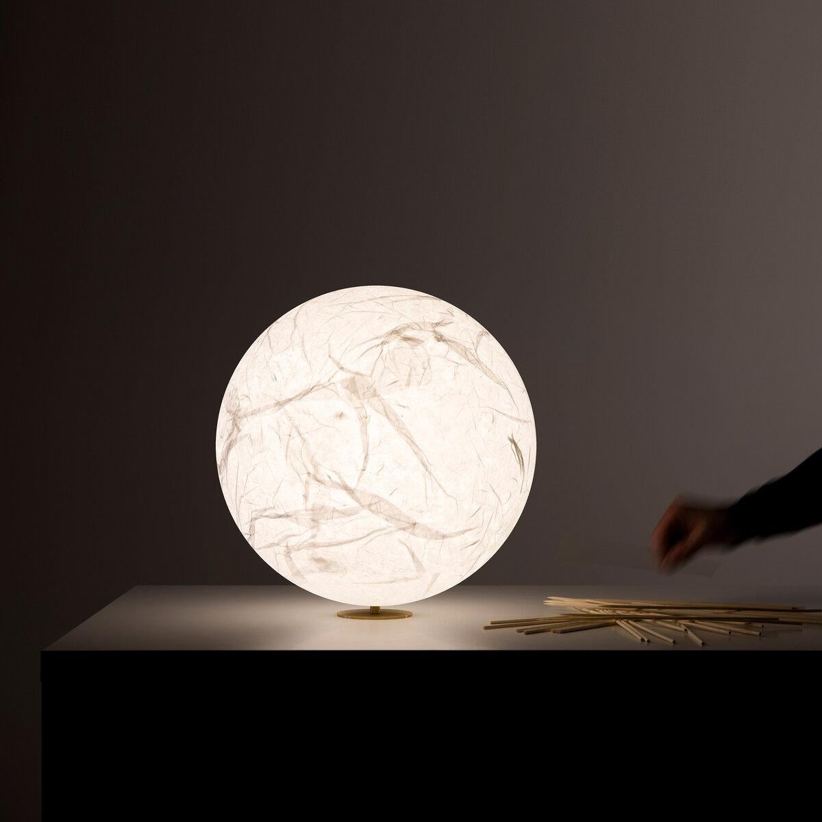 Moon was created from the dream of bringing the moon inside your own home.
The hand-made Japanese paper surface makes every lamp unique.
Suspension and floor versions available

Max 18W - E26
120V - 60Hz
Bulb not included
Dimmer on
