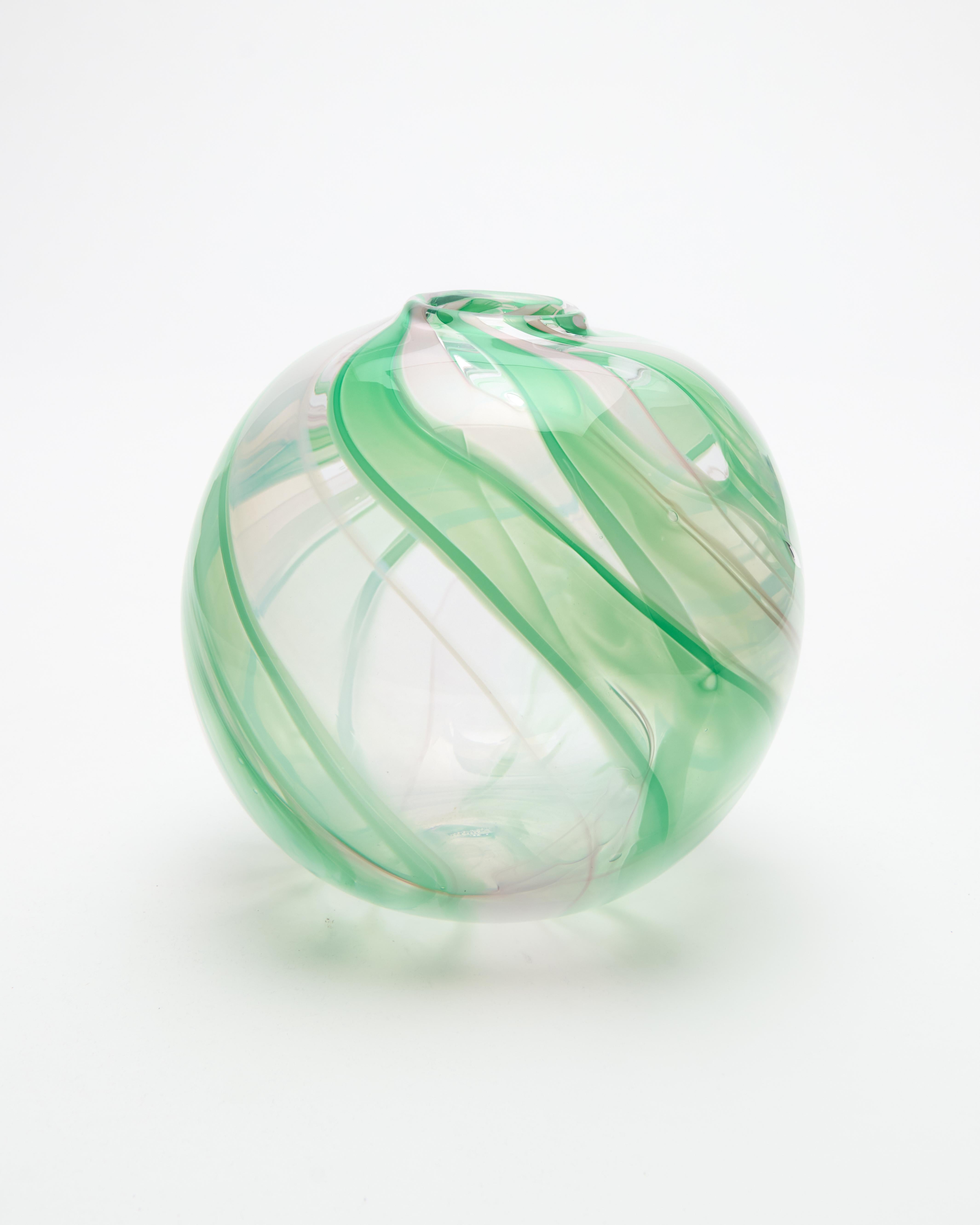 Voluminous in shape, iridescent in colour and with meticulously-crafted patterns, hand-blown and hand-sculptured Moonarij vases stand out as mesmerizing objects of beauty.

Our vases are defined by their signature striped pattern, formed using the