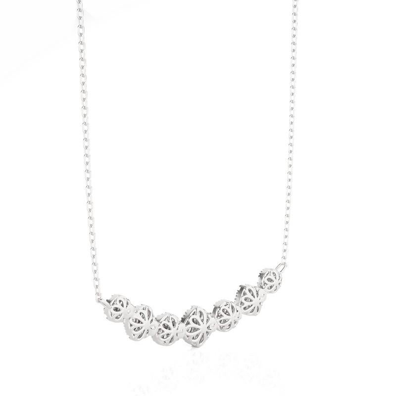 Carat Weight: A total of 1.4 carats of dazzling diamonds grace this necklace, promising to mesmerize.

Diamonds: Meticulously arranged, the necklace features 63 exquisite diamonds, each carefully selected to ensure brilliance.

Cluster Design: The