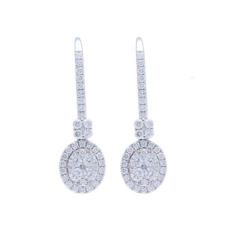 Diamond Total Carat Weight: These elegant earrings boast a total carat weight of 0.7 carats, showcasing a luxurious arrangement of 82 round diamonds in a stunning oval cluster design.

14K White Gold Setting: Crafted from lustrous 14K white gold,