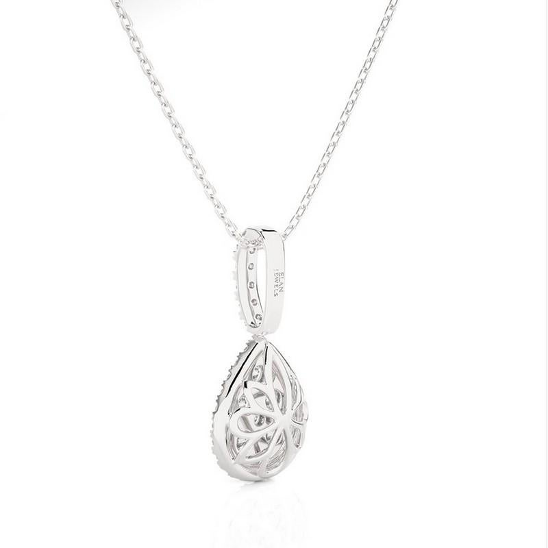 Diamond Total Carat Weight: This exquisite pendant boasts a total carat weight of 0.74 carats, showcasing a dazzling ensemble of 39 round diamonds arranged in a captivating pear cluster design.

Diamonds: The pendant features a cluster of 39 round