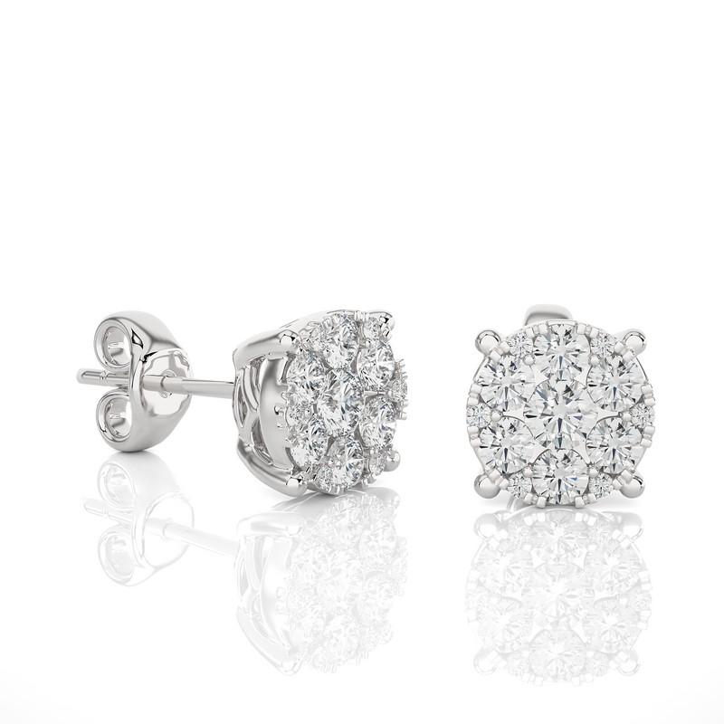 Carat Weight: These exquisite stud earrings boast a total carat weight of 0.7 carats, promising a delicate yet captivating sparkle.

Diamonds: Each earring features a meticulous arrangement of 26 excellent round diamonds, selected for their