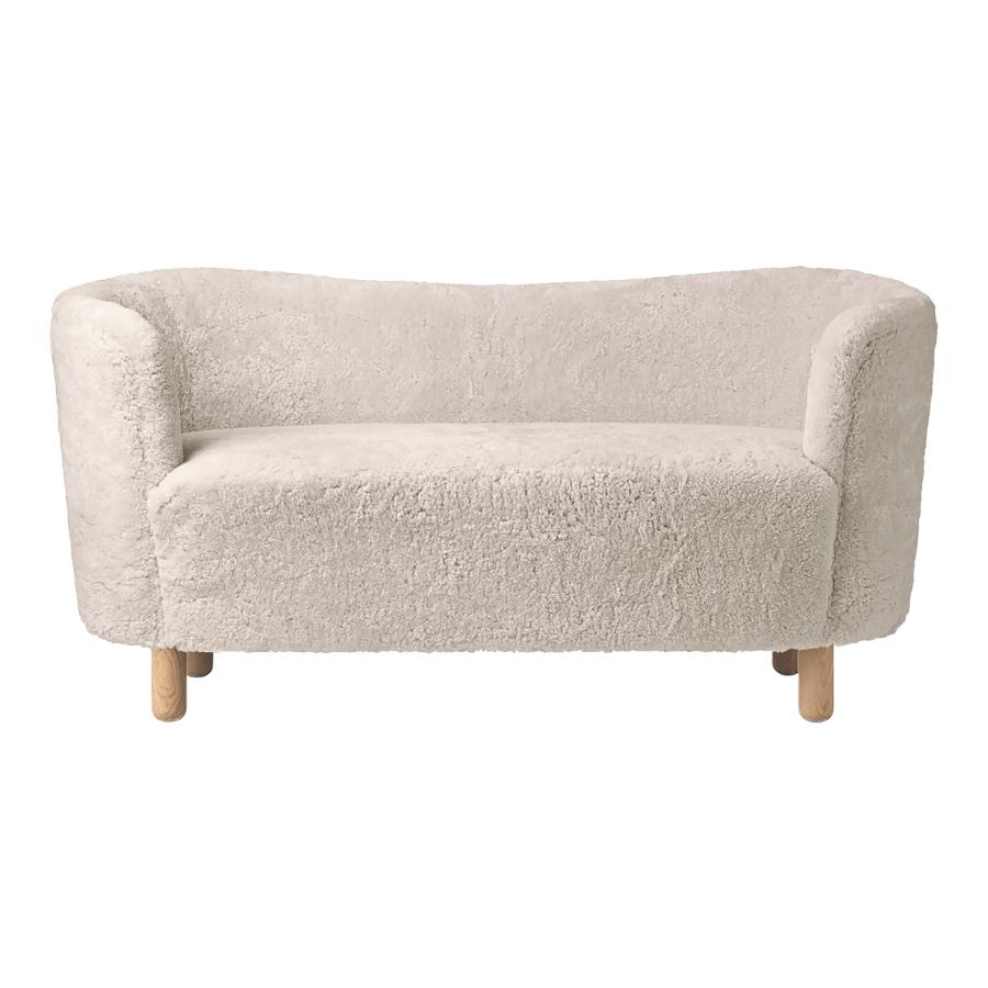 Moonlight sheepskin and natural oak mingle sofa by Lassen
Dimensions: W 154 x D 68 x H 74 cm 
Materials: sheepskin, oak.

The Mingle sofa was designed in 1935 by architect Flemming Lassen (1902-1984) and was presented at The Copenhagen