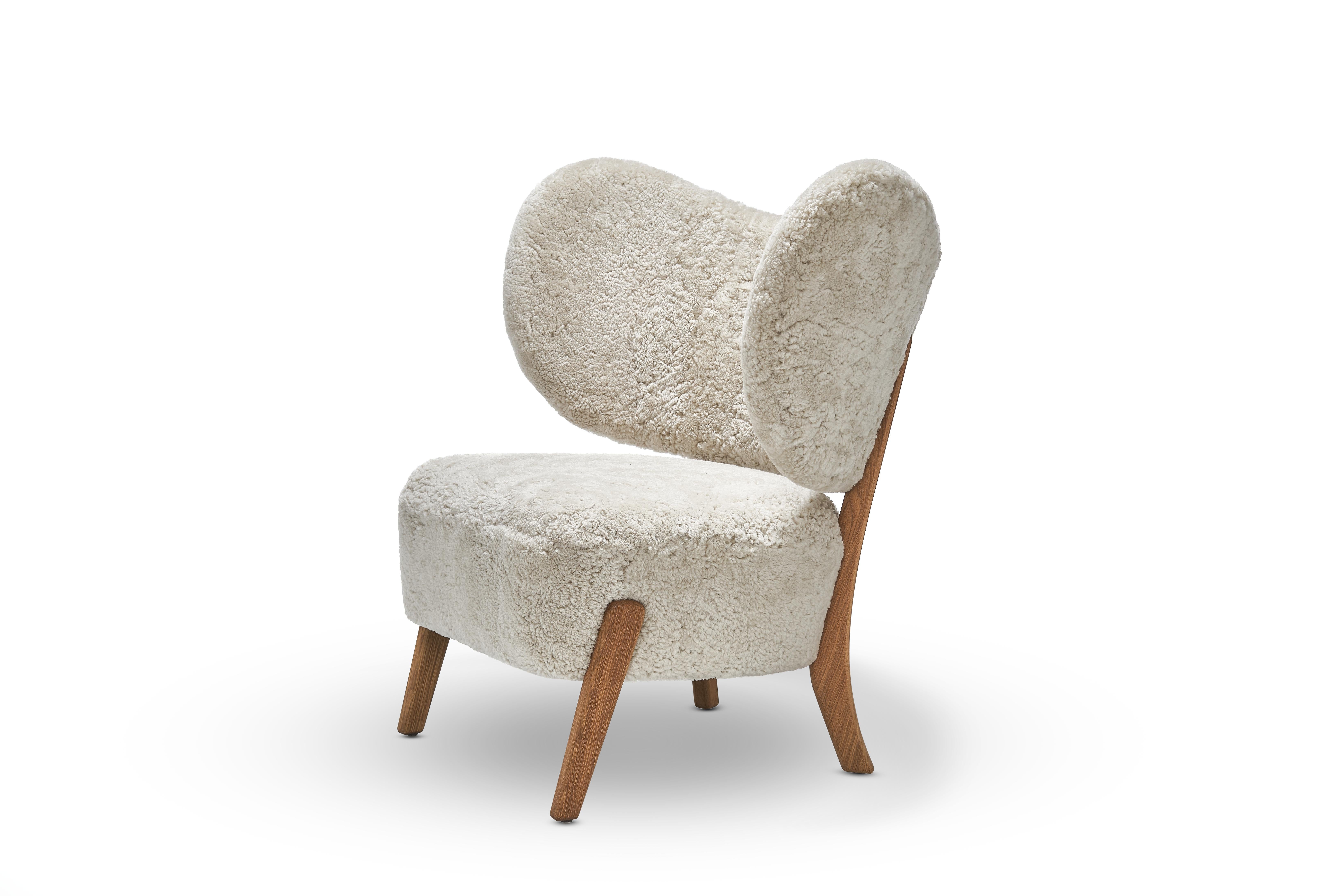 Moonlight Sheepskin TMBO lounge chair by Mazo Design
Dimensions: W 90 x D 68.5 x H 87 cm
Materials: Oak, Sheepskin.
Also available: ROMO/Linara, DAW/Royal, KVADRAT/Remix, KVADRAT/Hallingdal & Fiord, BUTE/Storr, DEDAR/Linear,
DAW/Mohair & Mcnutt,