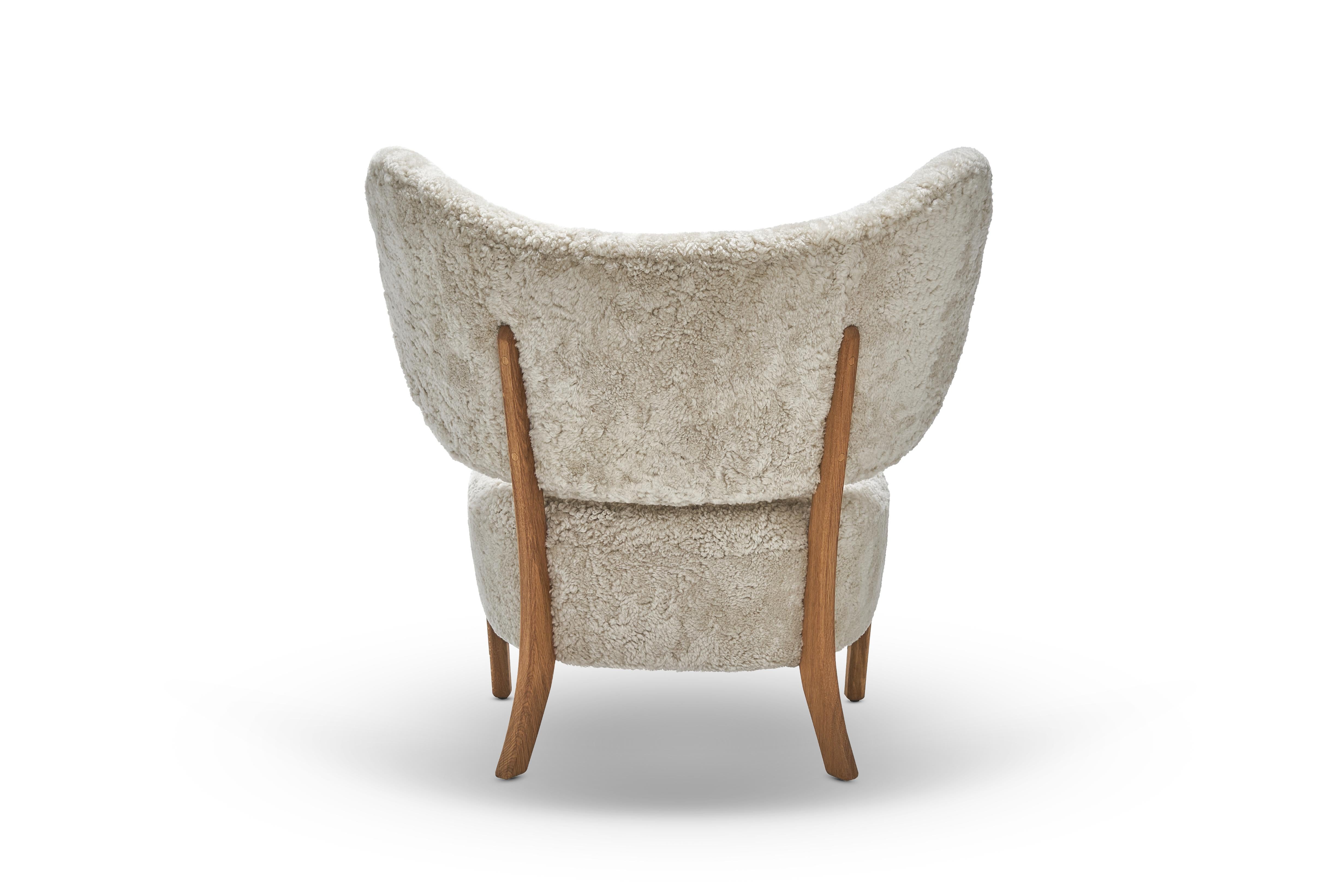 Danish Moonlight Sheepskin Tmbo Lounge Chair by Mazo Design For Sale