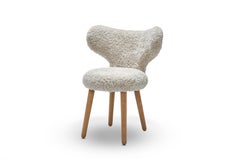 White WNG Chairs in Moonlight Sheepskin Upholstery by Mazo Design